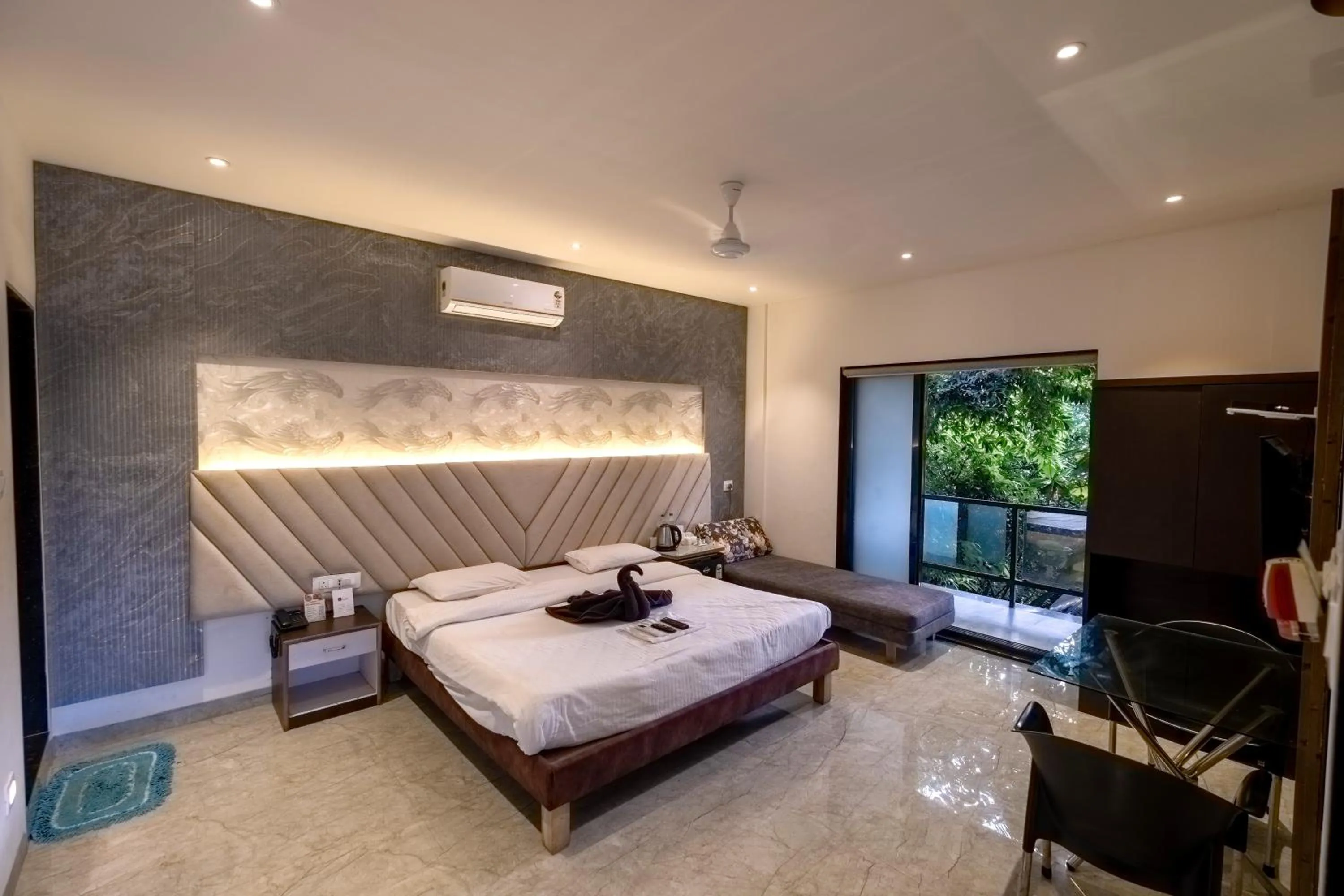 Bed in Sanidhya Beach Resort & Spa