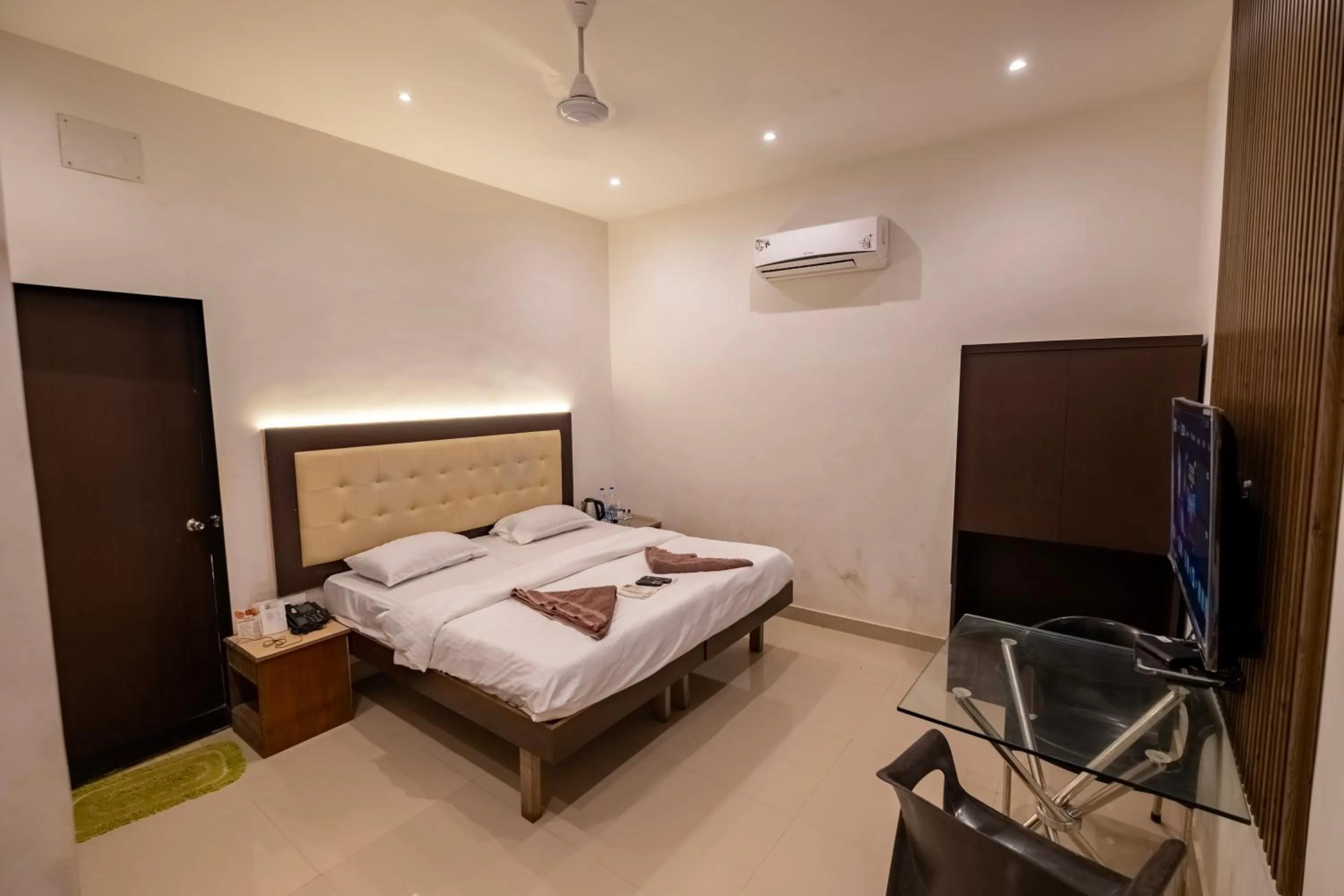 Bed in Sanidhya Beach Resort & Spa