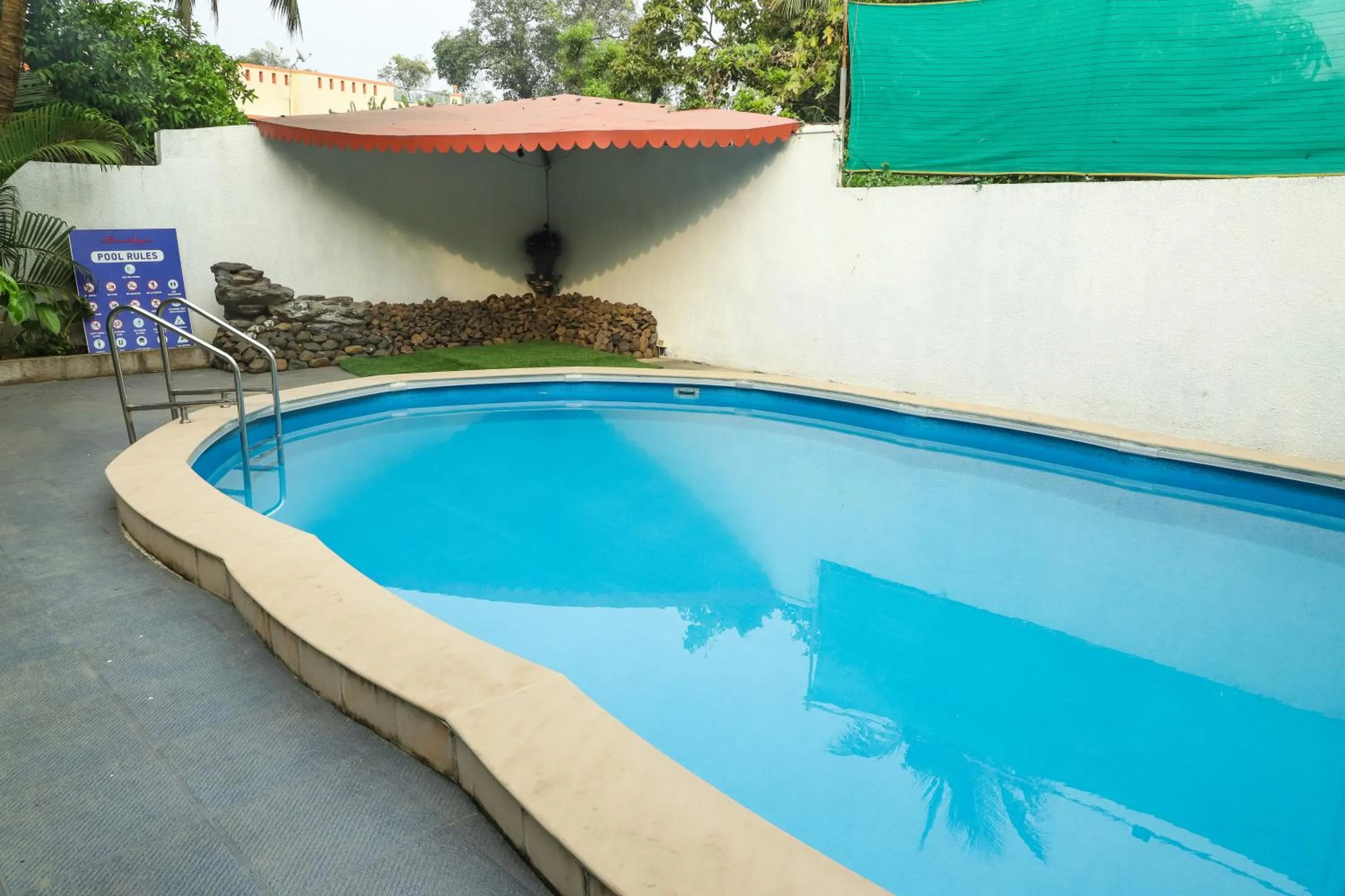 Swimming pool in Sanidhya Beach Resort & Spa