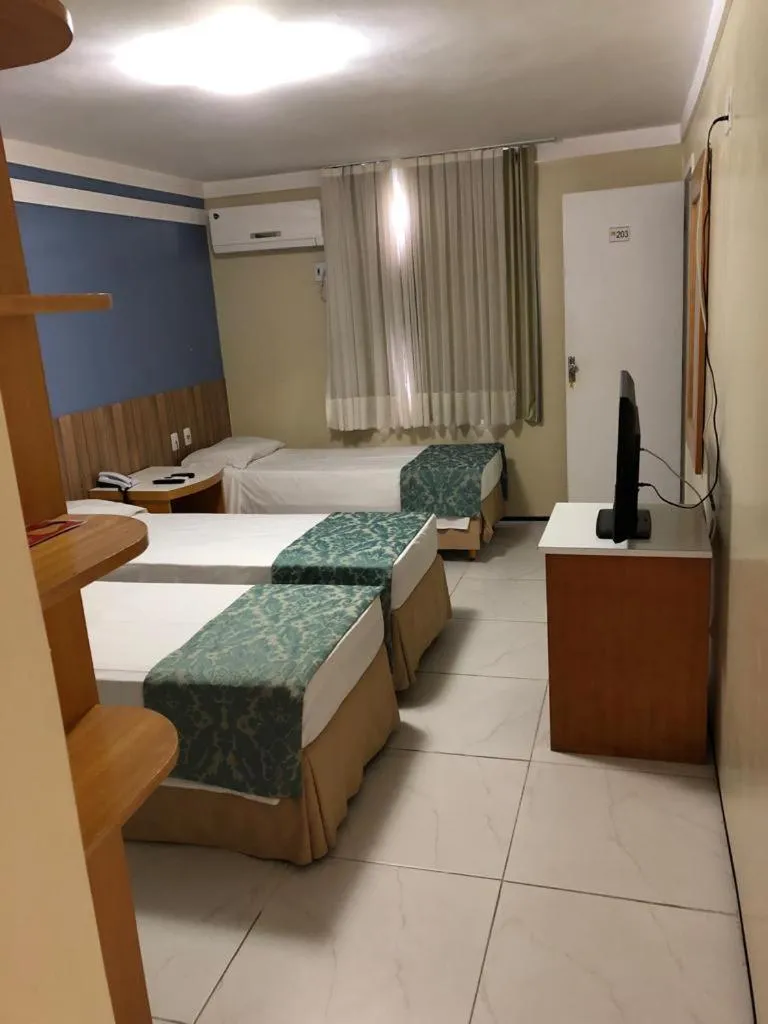 Bed in Raio de Sol Praia Hotel