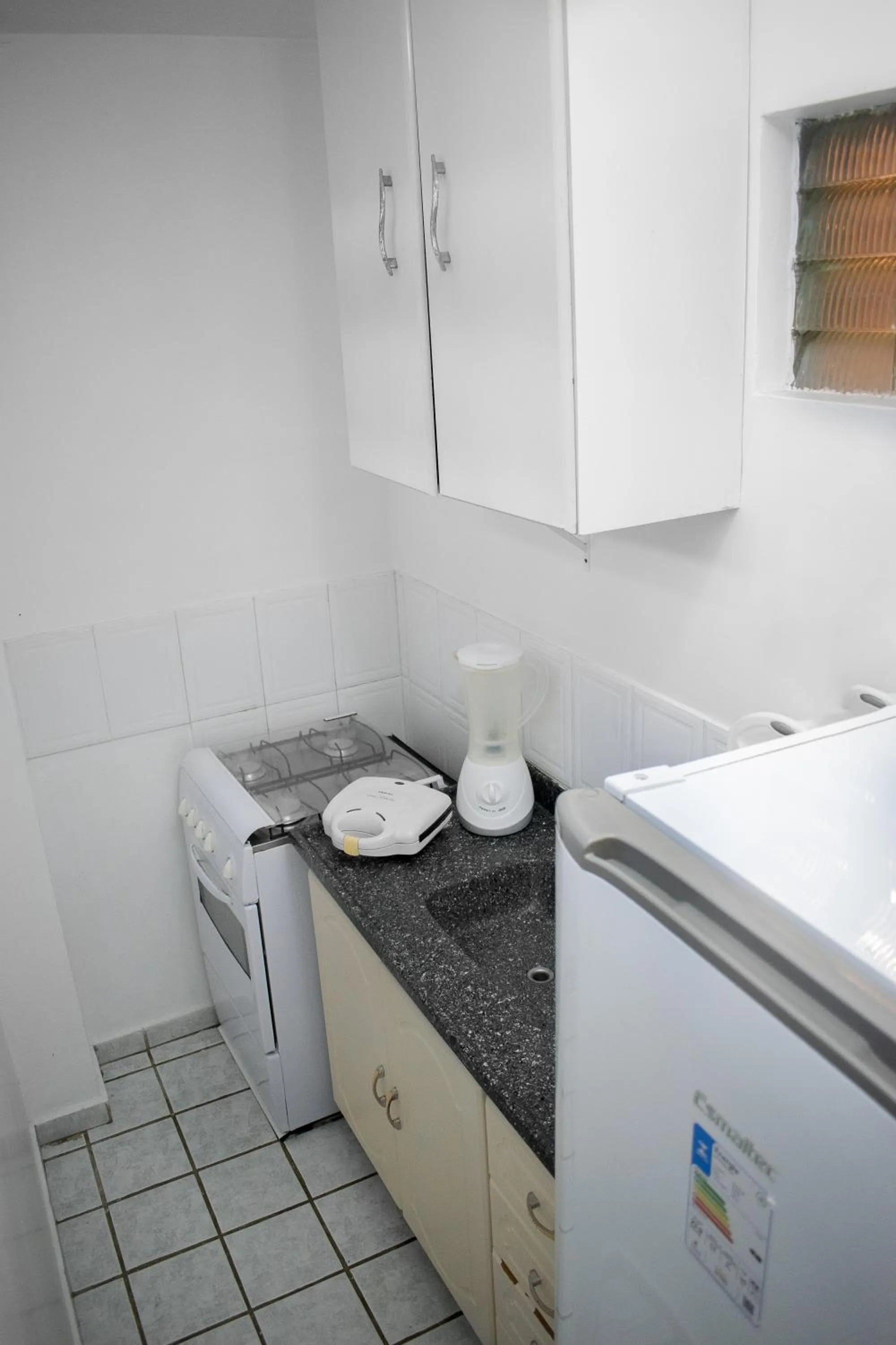 Kitchen or kitchenette in Hotel Pousada Estacao Do Sol Natal