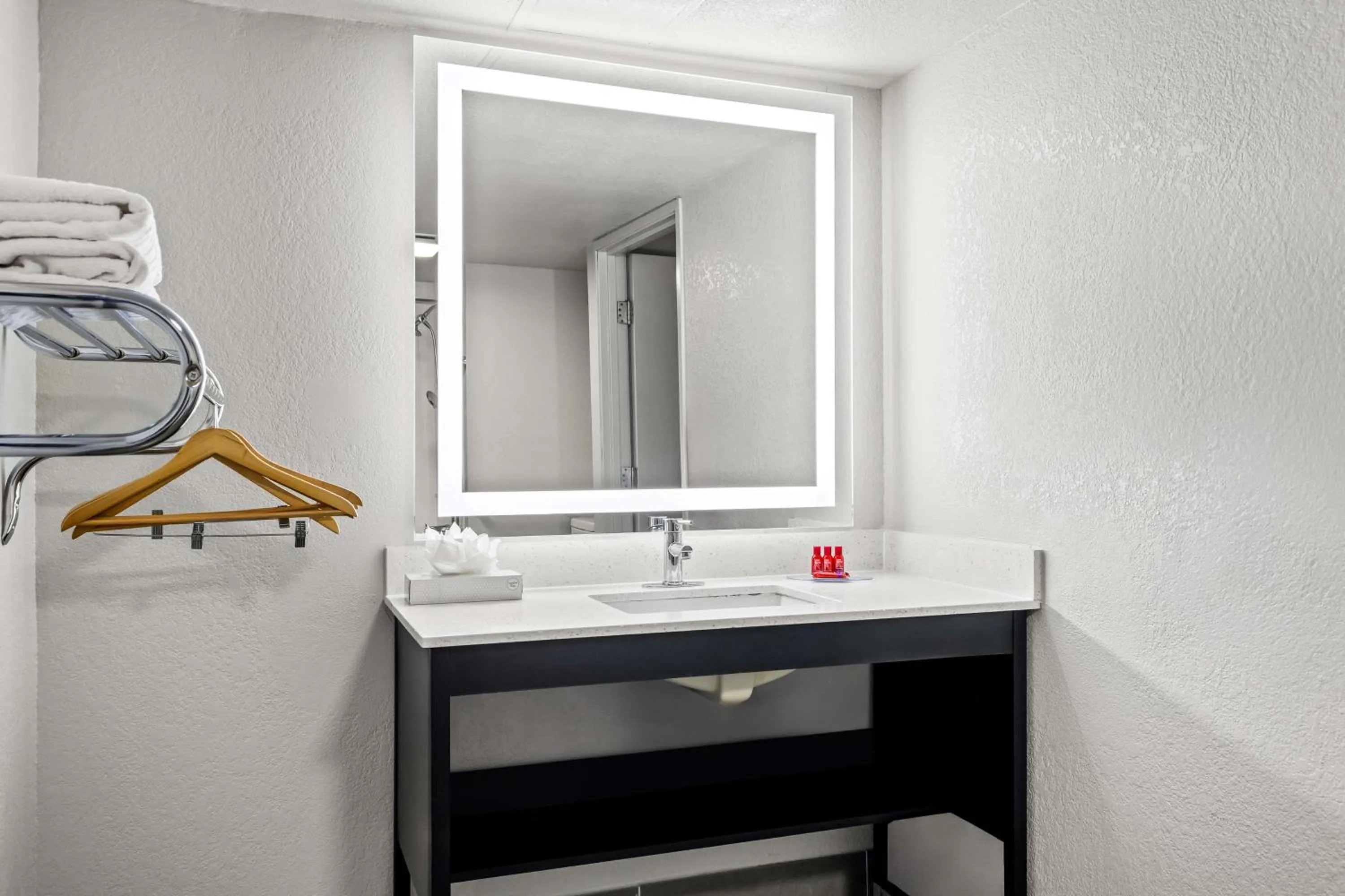 Bathroom in SureStay Hotel by Best Western Phoenix Airport