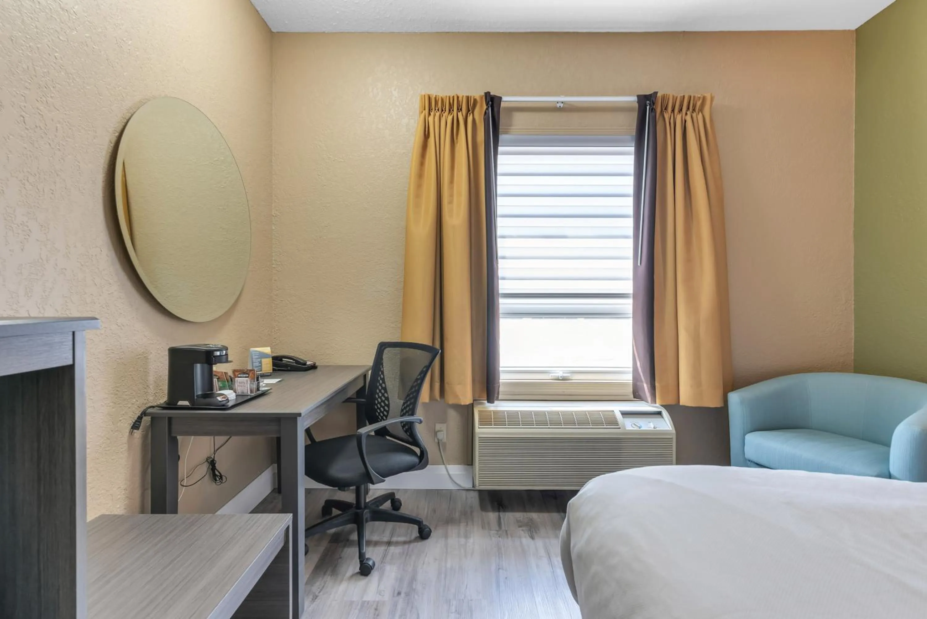 Bed in Quality Inn & Suites