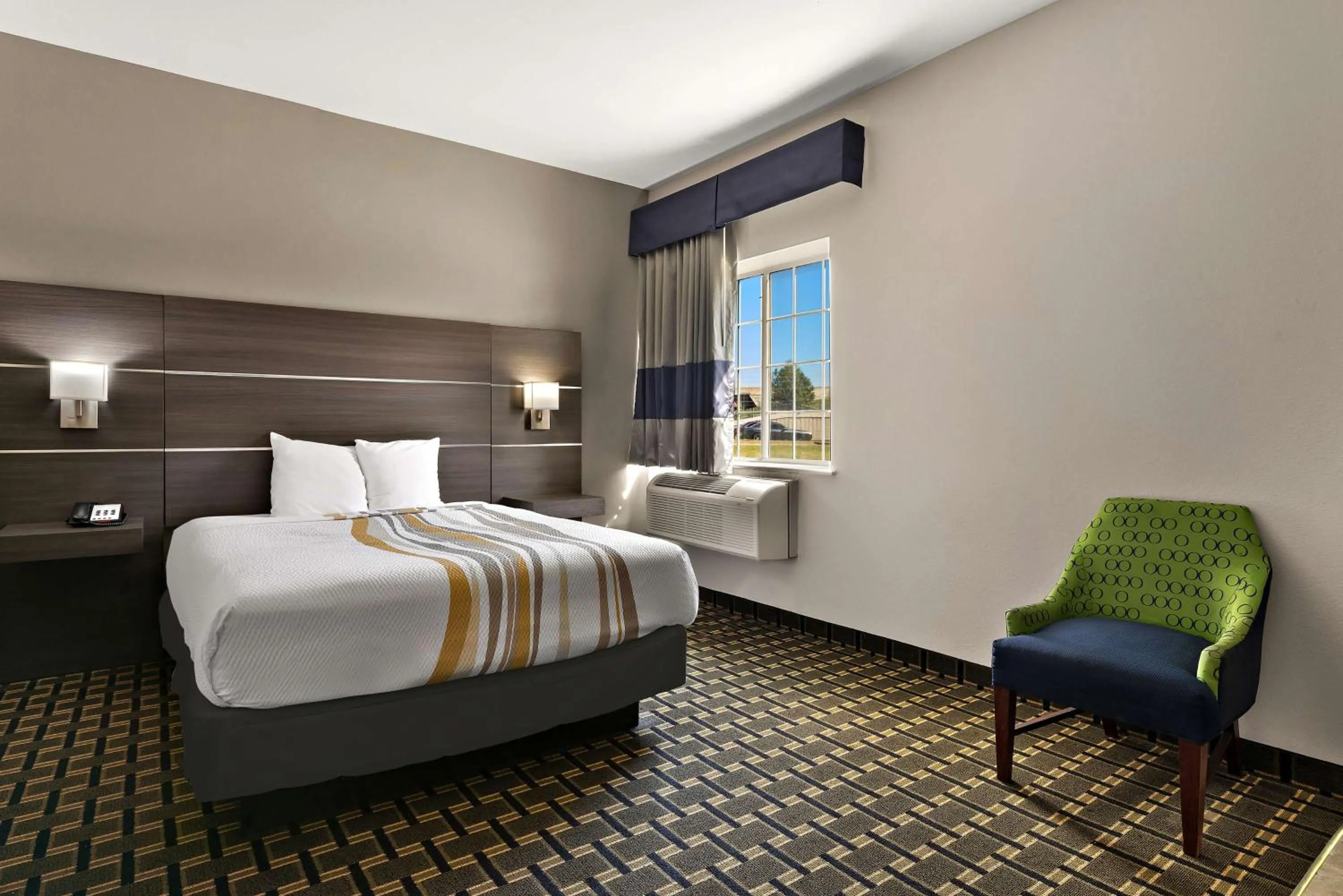 Bedroom, Bed in SureStay Plus Hotel by Best Western Tulsa East
