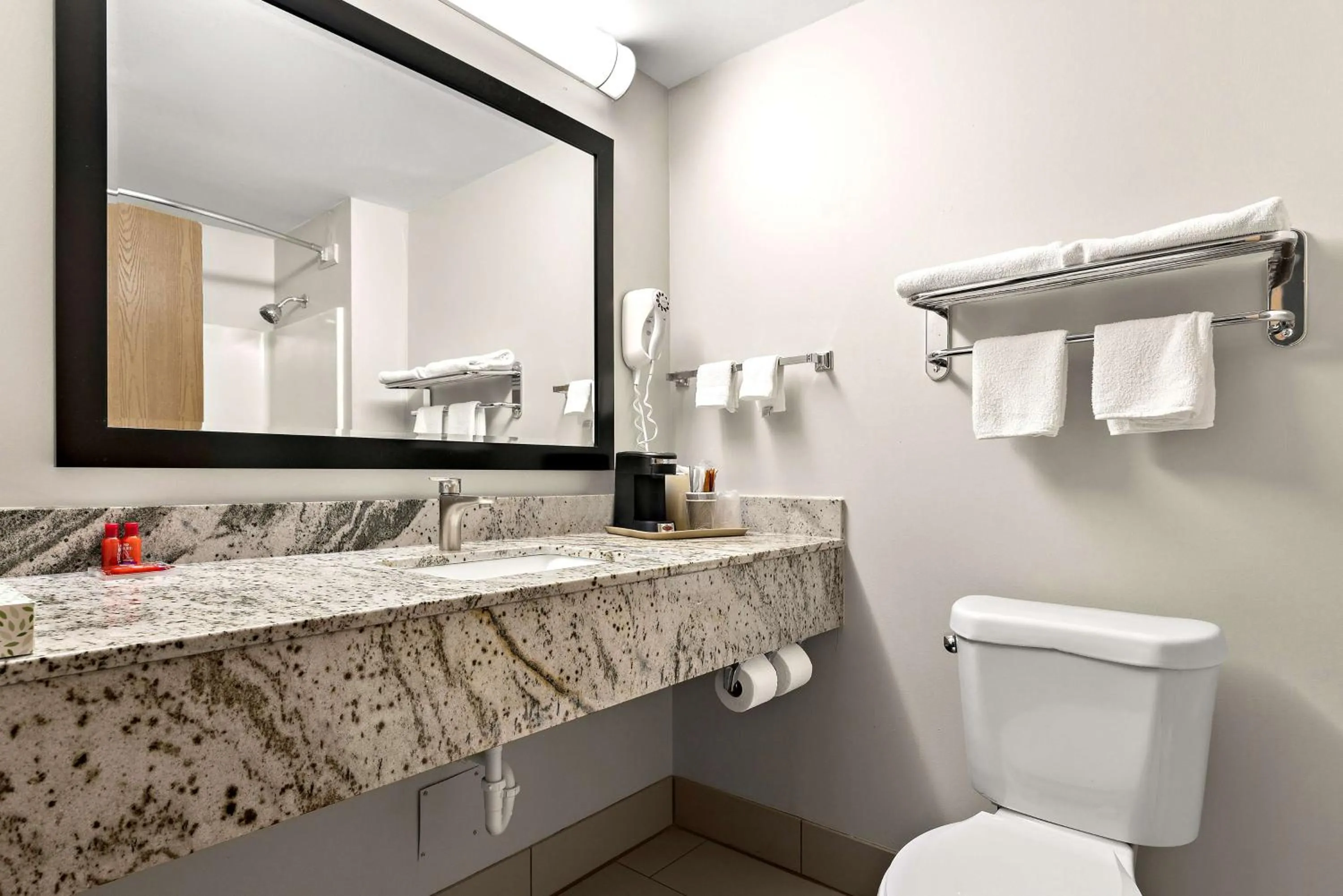 Bathroom in SureStay Plus Hotel by Best Western Tulsa East