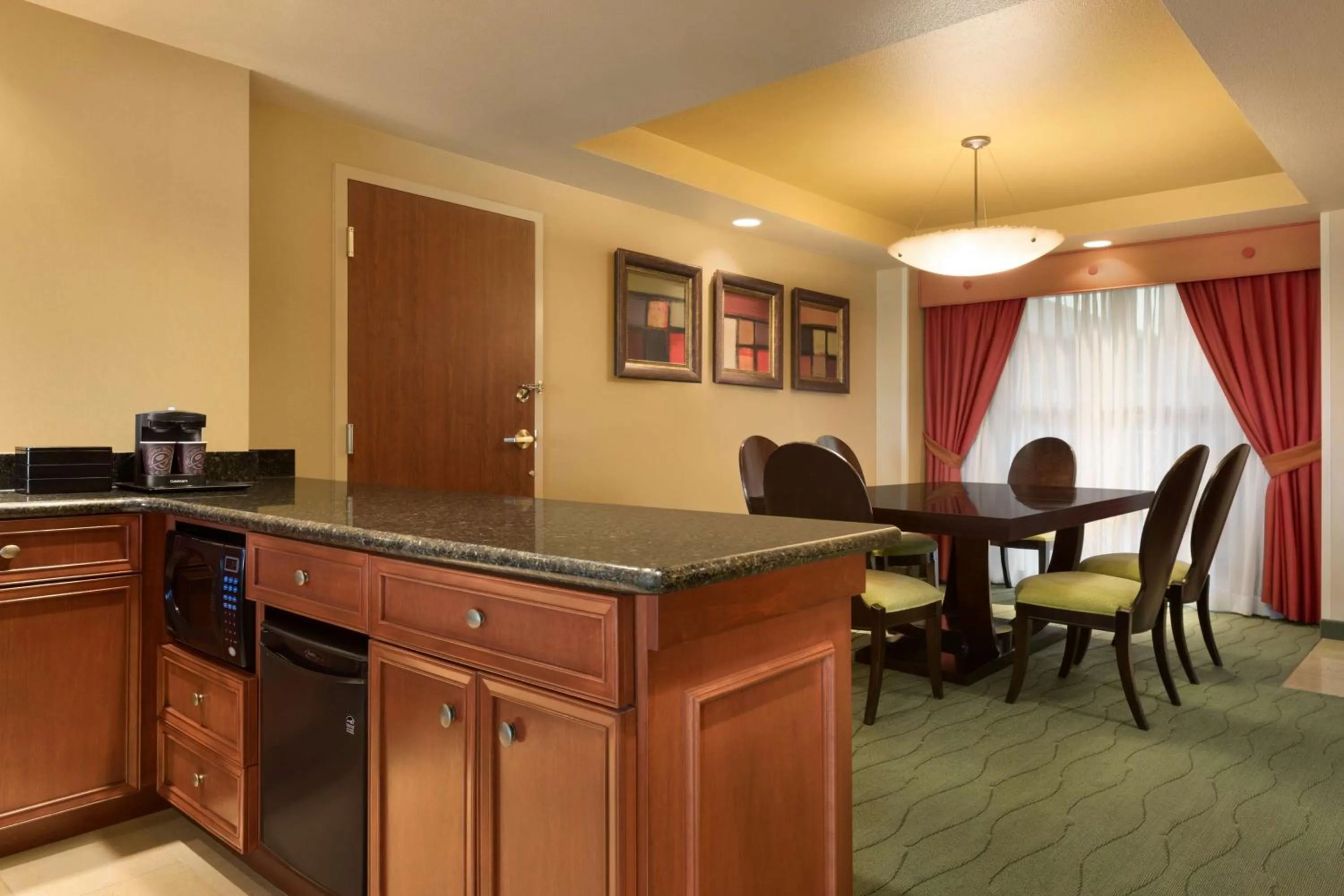 Kitchen or kitchenette in Embassy Suites East Peoria Hotel and Riverfront Conference Center