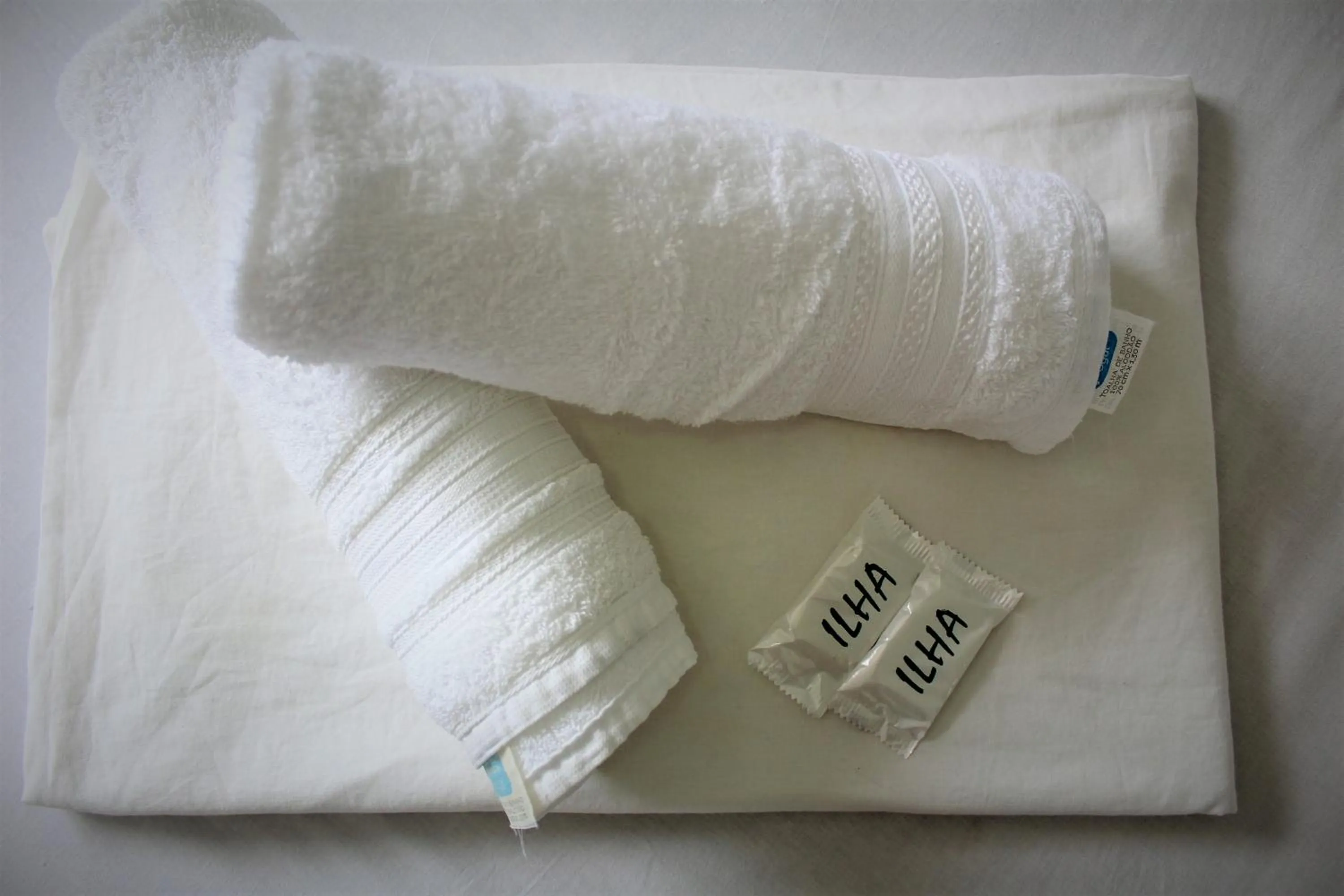 towels, Bed in Pousada Santa Ana