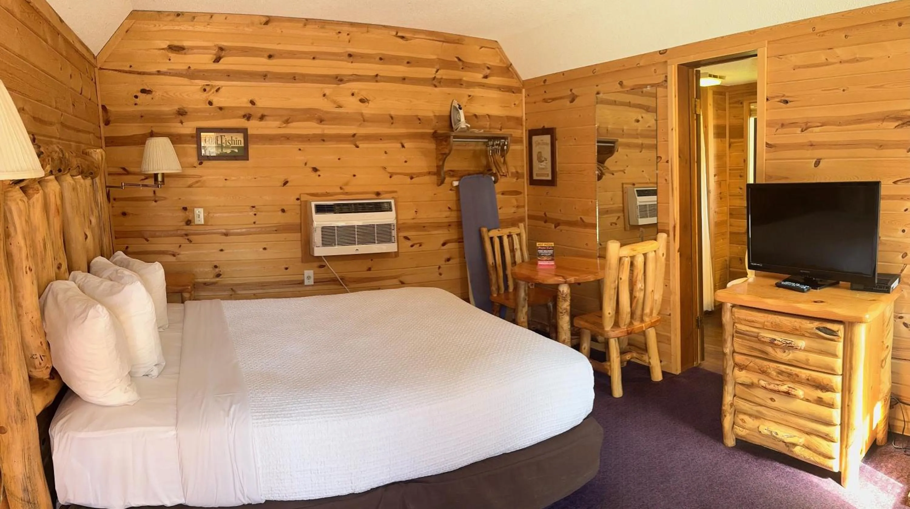 Bed in Cabins of Mackinac & Lodge