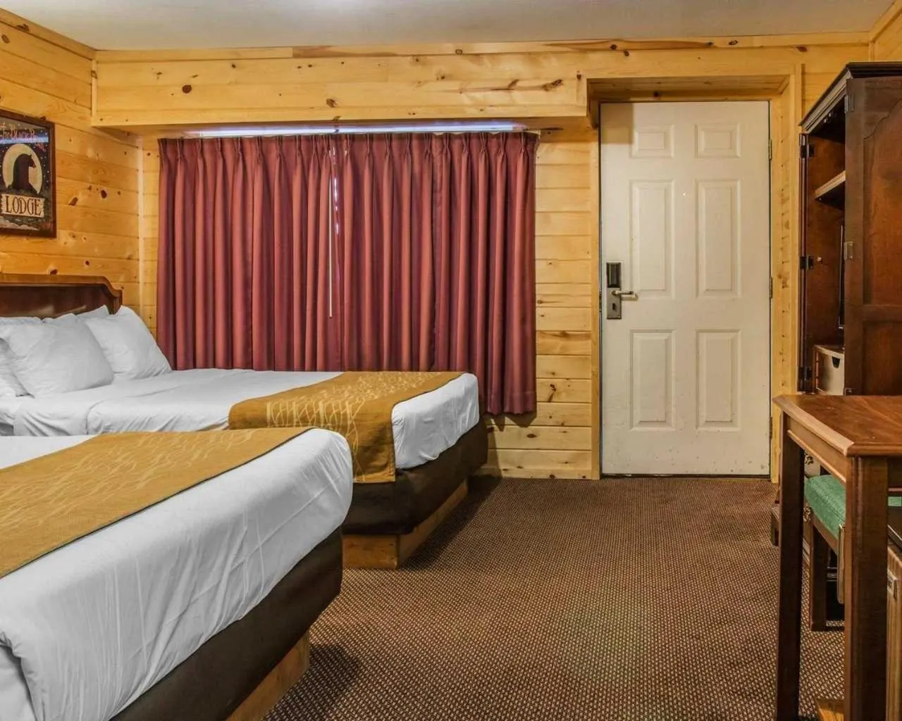 Bed in Cabins of Mackinac & Lodge