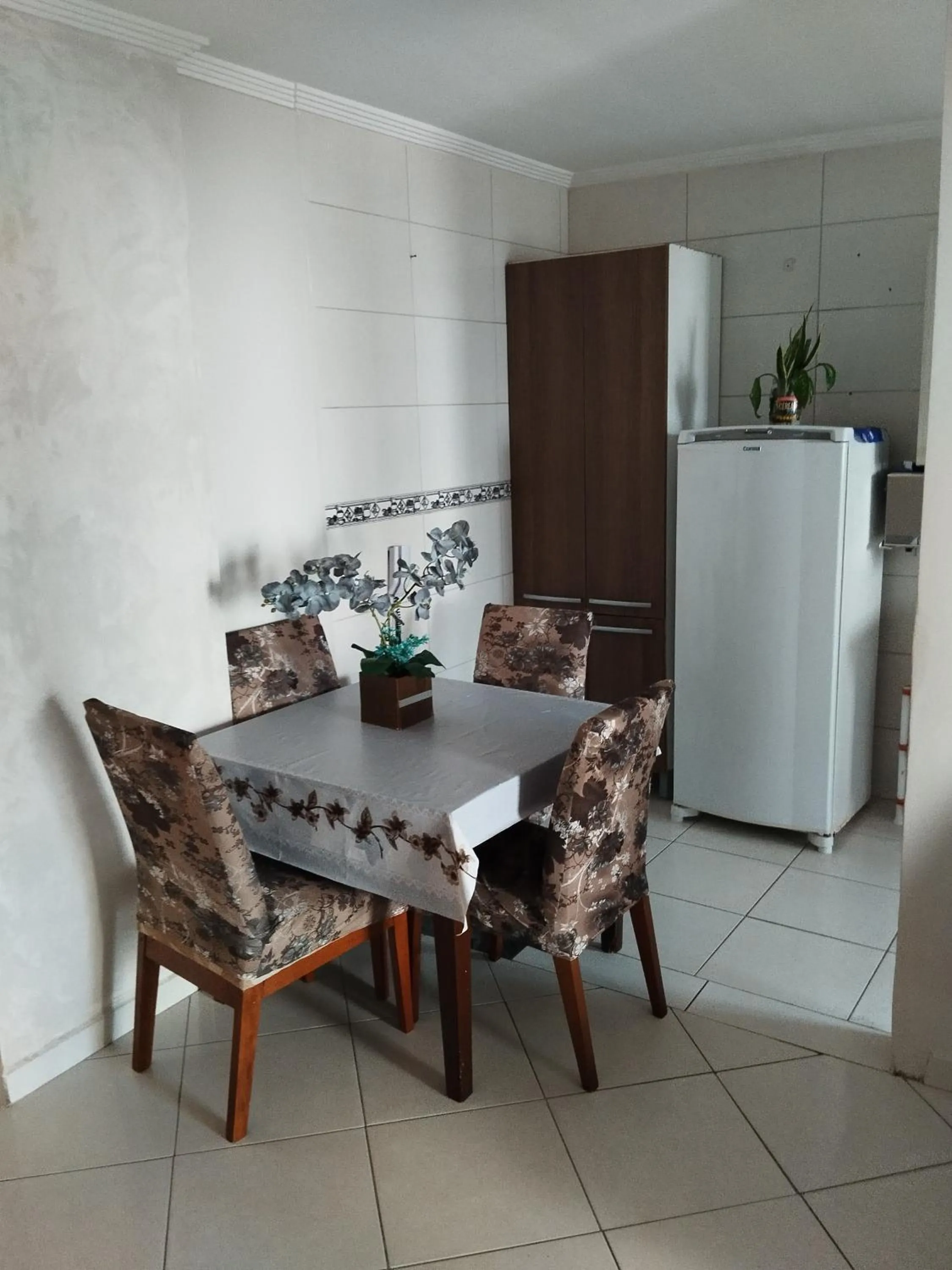 Dining area in Apê Temporada Praia Grande SP Completo com Piscina, Churrasqueira, Estacionamento, Wi-Fi