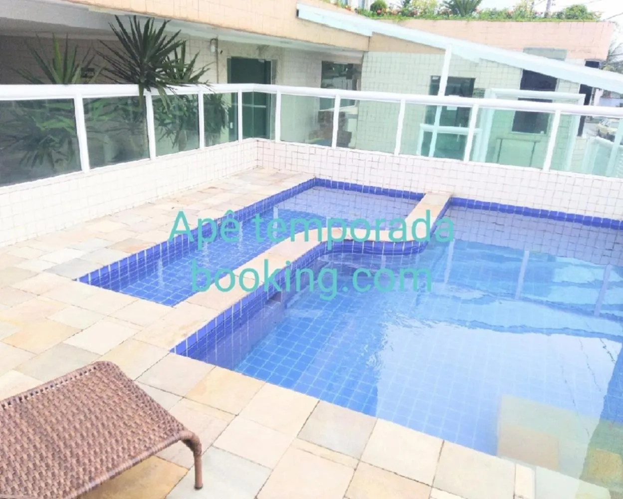 Property building in Apê Temporada Praia Grande SP Completo com Piscina, Churrasqueira, Estacionamento, Wi-Fi