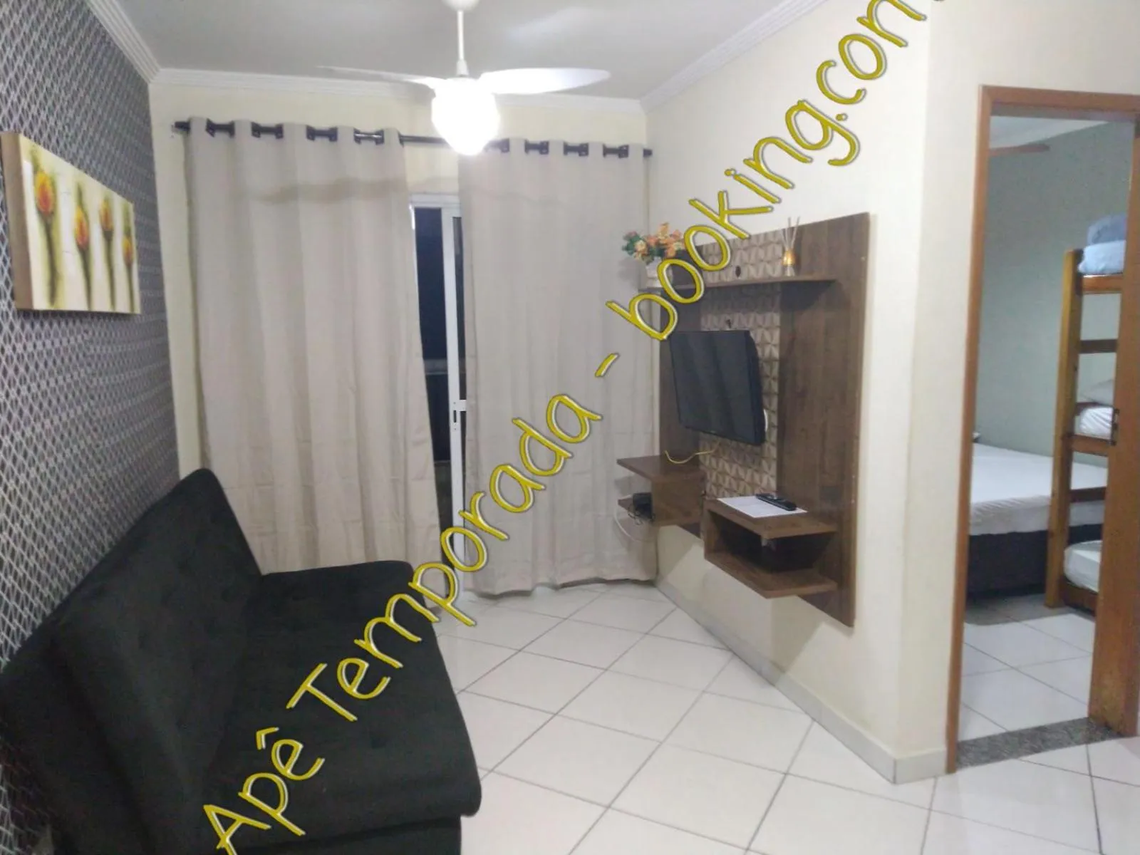 TV and multimedia in Apê Temporada Praia Grande SP Completo com Piscina, Churrasqueira, Estacionamento, Wi-Fi