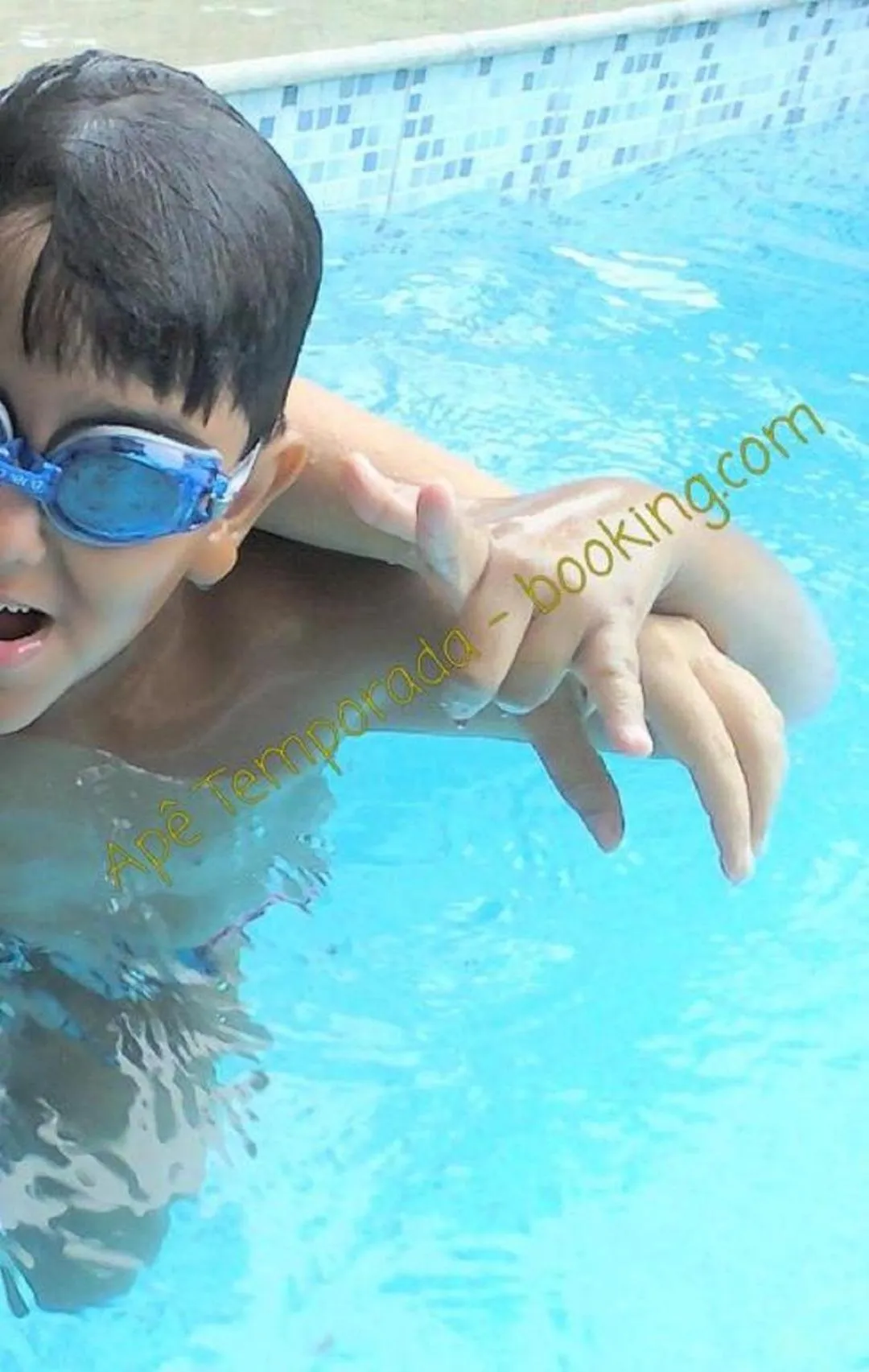 Swimming pool in Apê Temporada Praia Grande SP Completo com Piscina, Churrasqueira, Estacionamento, Wi-Fi