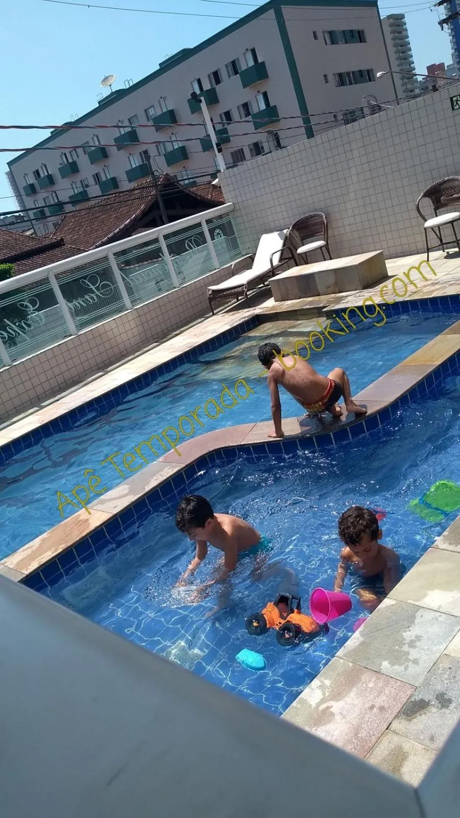 Swimming pool in Apê Temporada Praia Grande SP Completo com Piscina, Churrasqueira, Estacionamento, Wi-Fi