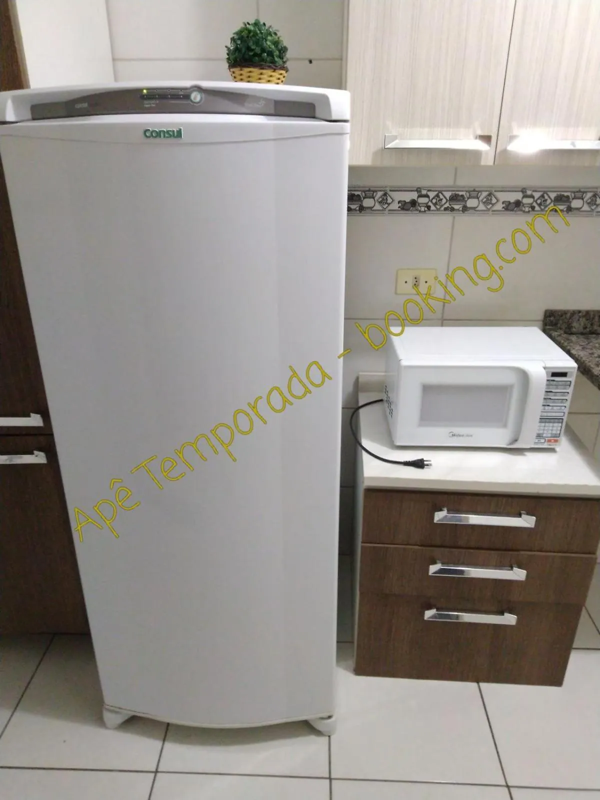 Kitchen or kitchenette in Apê Temporada Praia Grande SP Completo com Piscina, Churrasqueira, Estacionamento, Wi-Fi