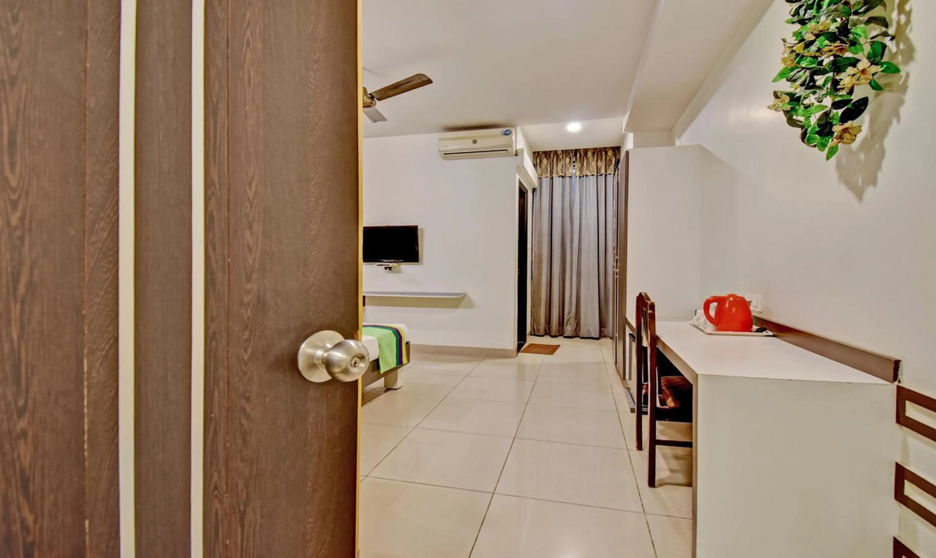 Bedroom in Treebo Raj Elegance Manyata Tech Park