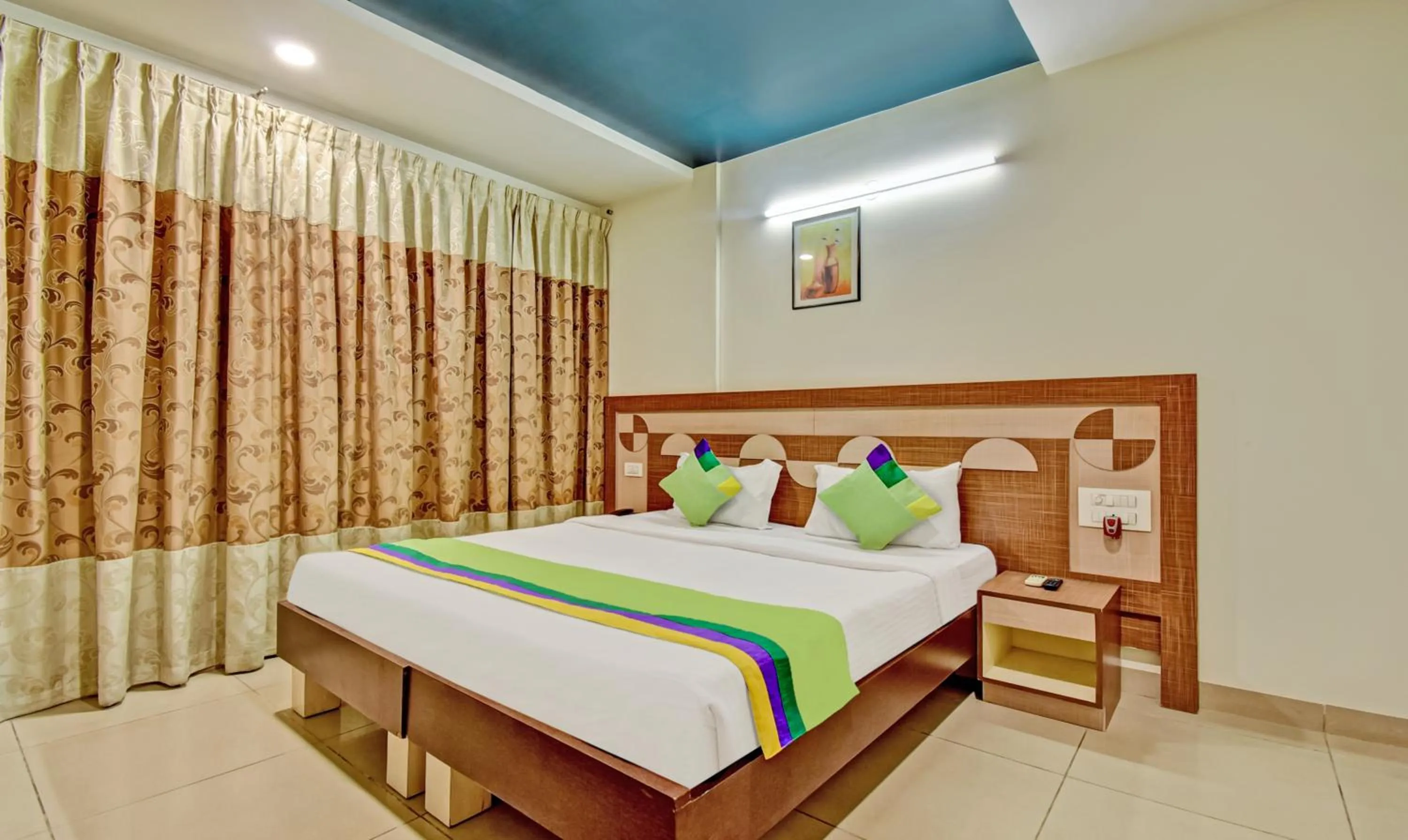 Bedroom, Bed in Treebo Raj Elegance Manyata Tech Park