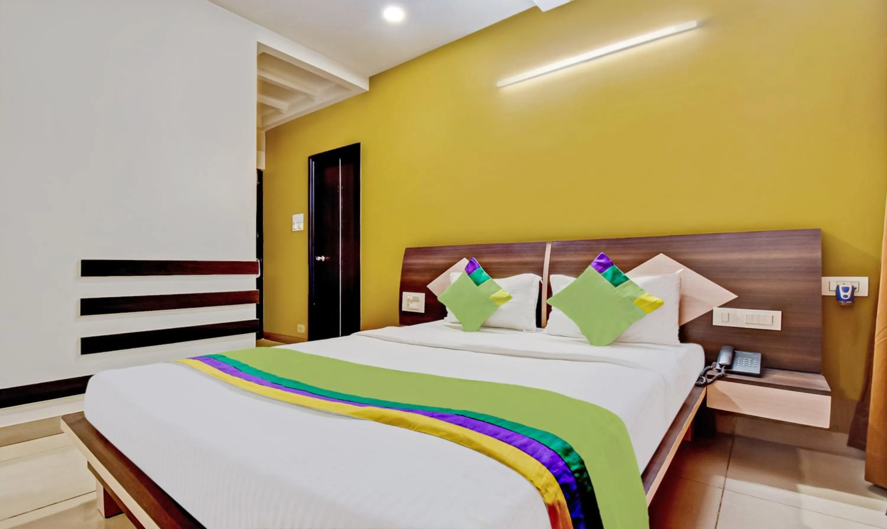 Bedroom, Bed in Treebo Raj Elegance Manyata Tech Park