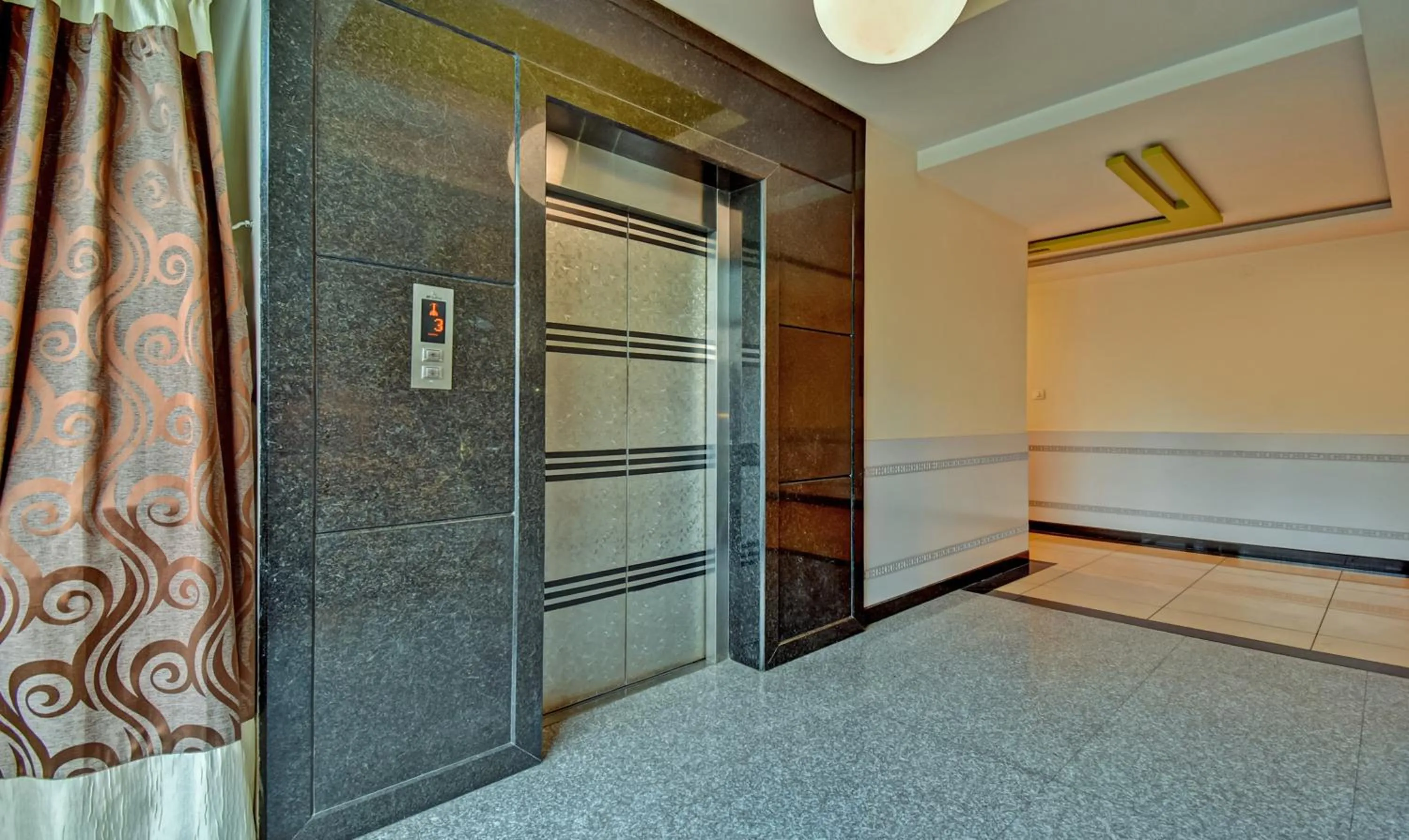 elevator in Treebo Raj Elegance Manyata Tech Park