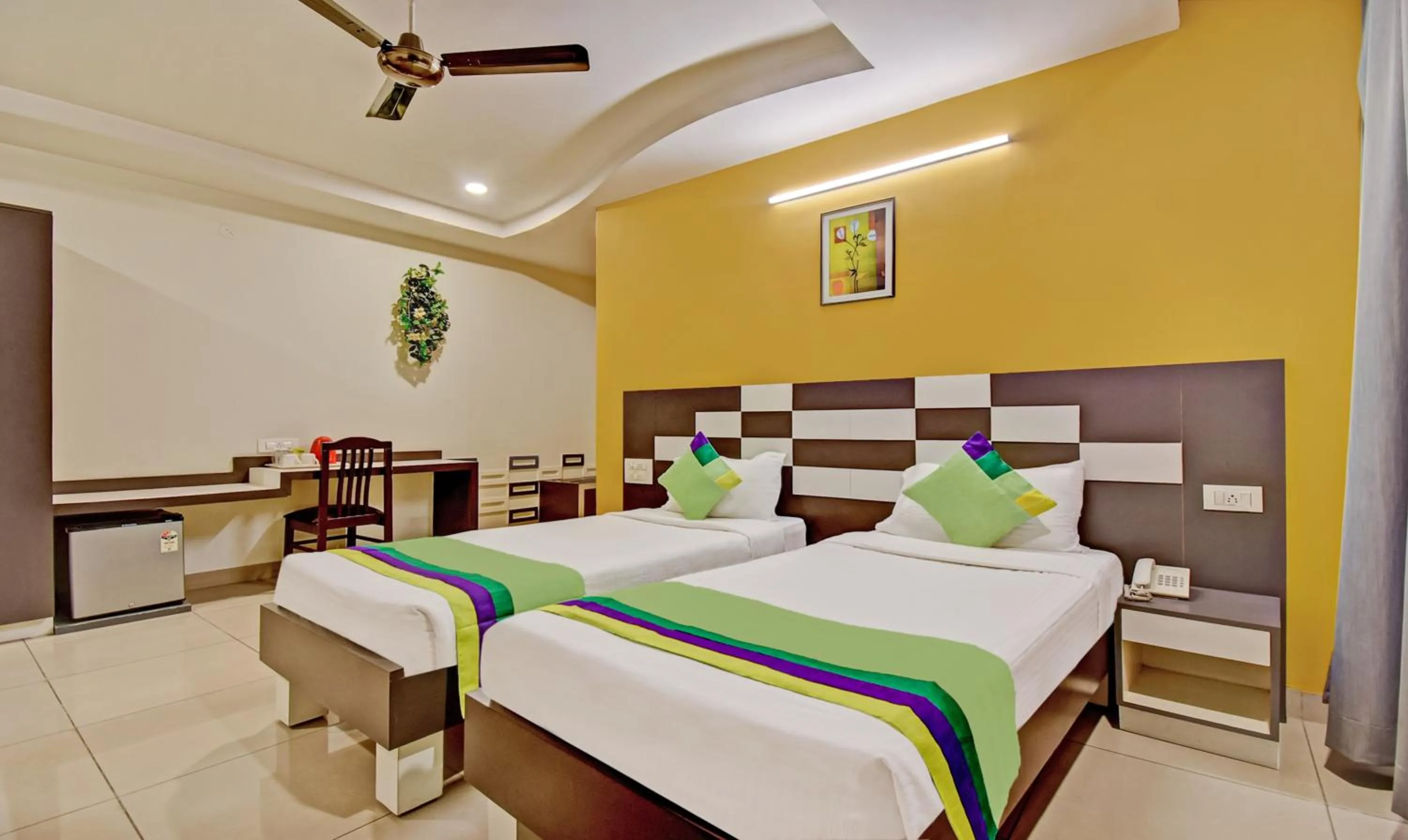 Bedroom, Bed in Treebo Raj Elegance Manyata Tech Park