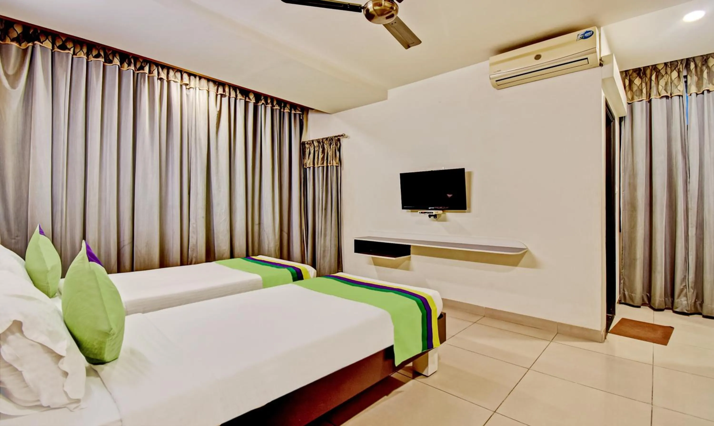 Bedroom, Bed in Treebo Raj Elegance Manyata Tech Park