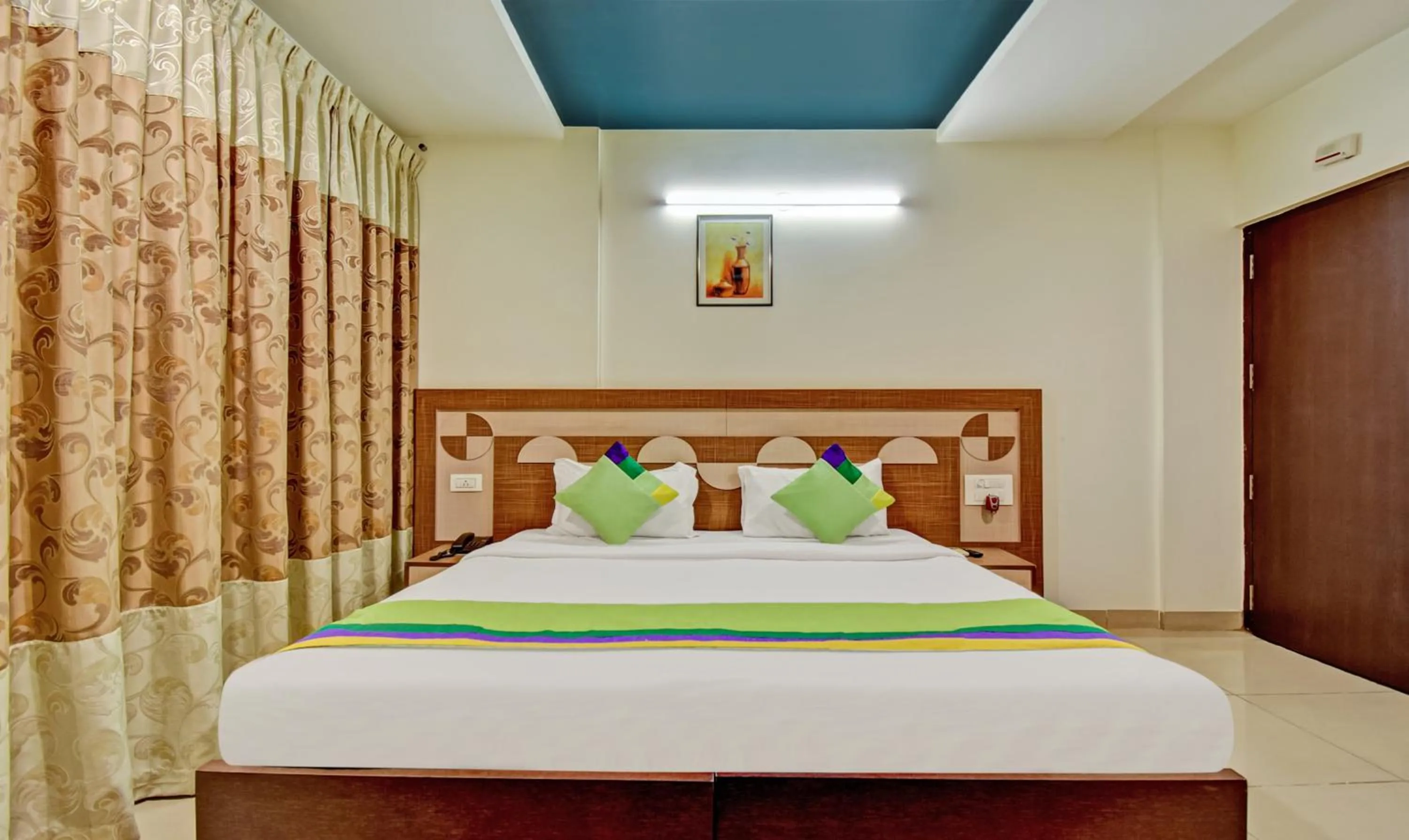 Bedroom, Bed in Treebo Raj Elegance Manyata Tech Park
