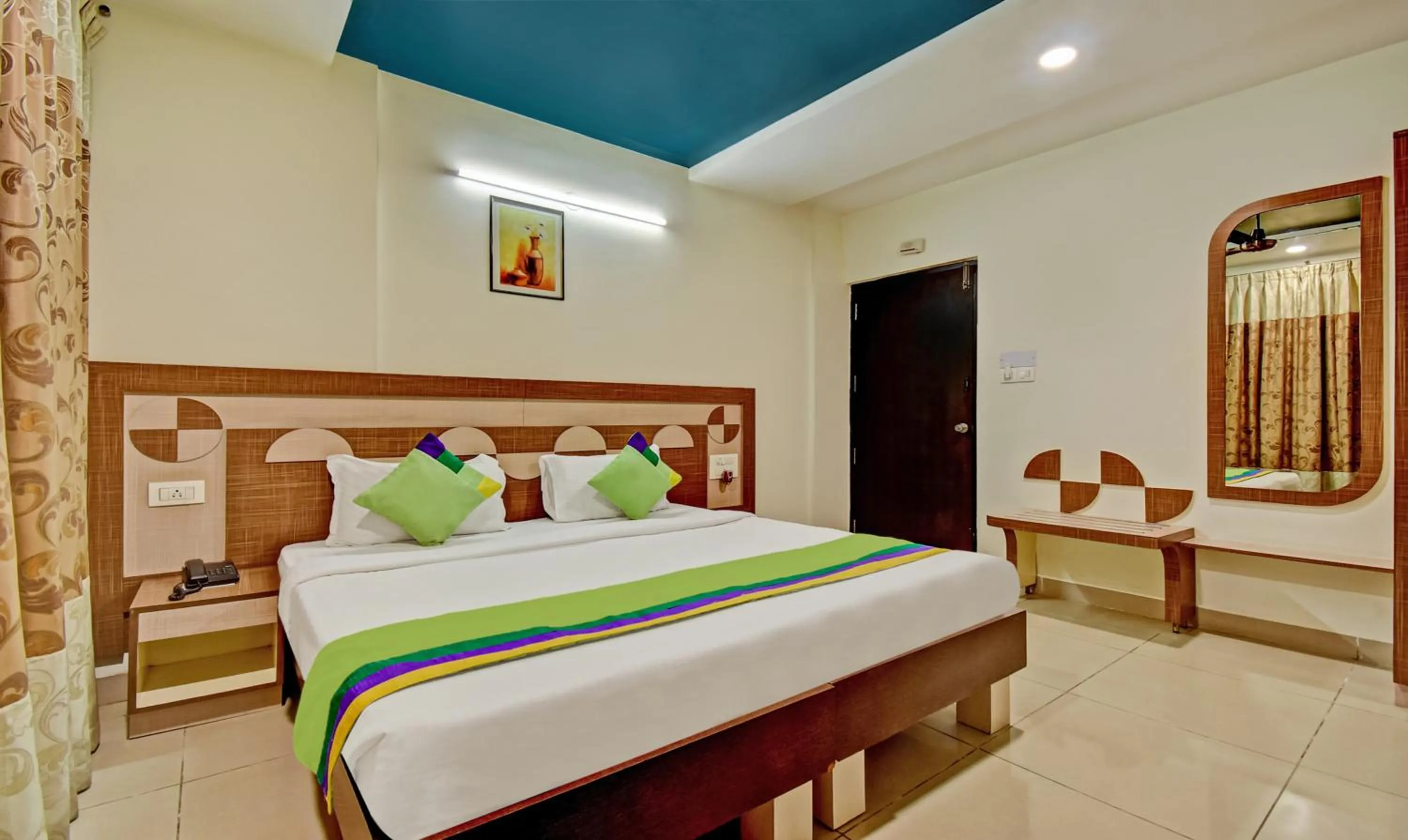 Bedroom, Bed in Treebo Raj Elegance Manyata Tech Park