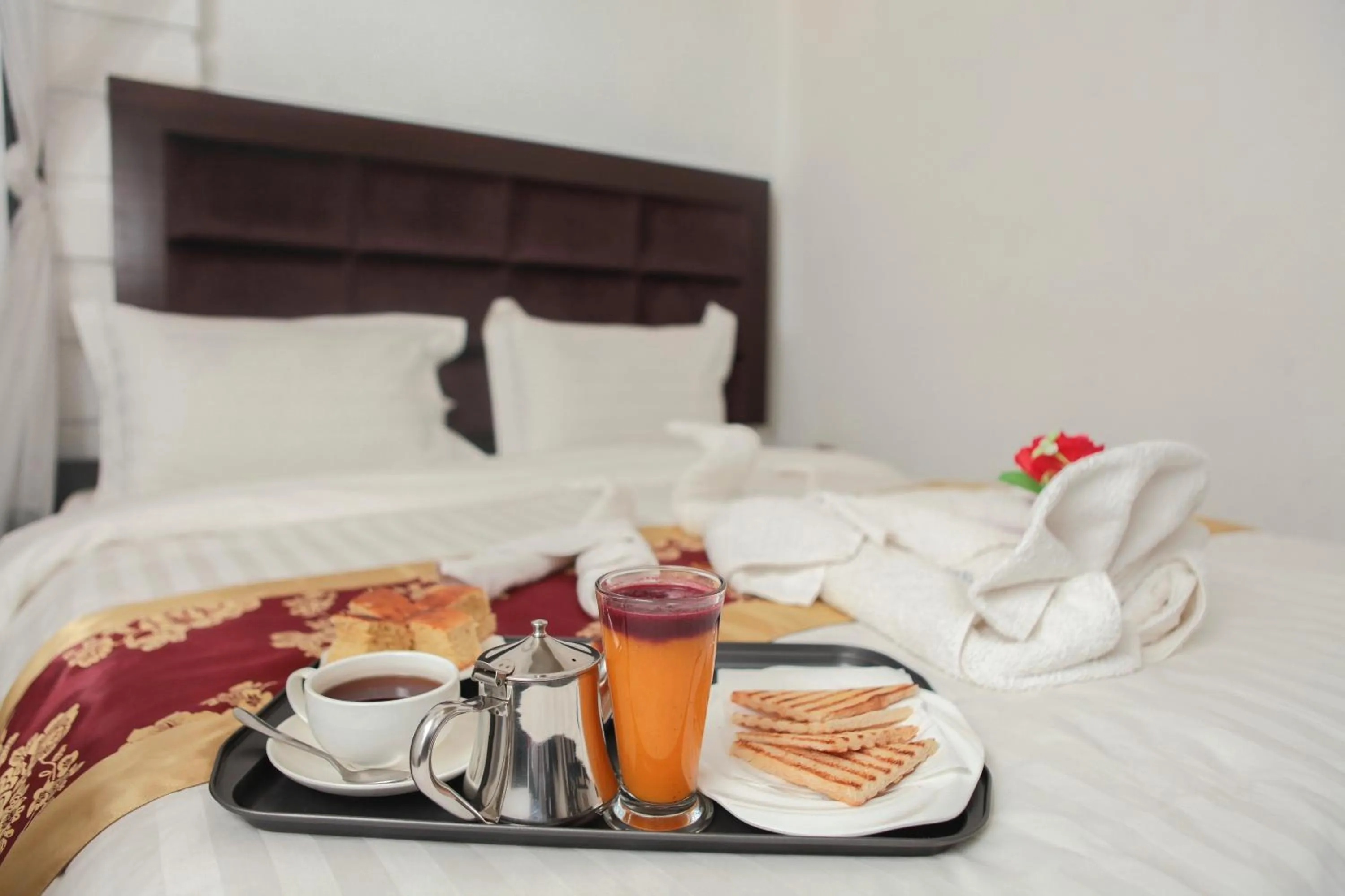 Bed in Hotel Kangaroo Bujumbura