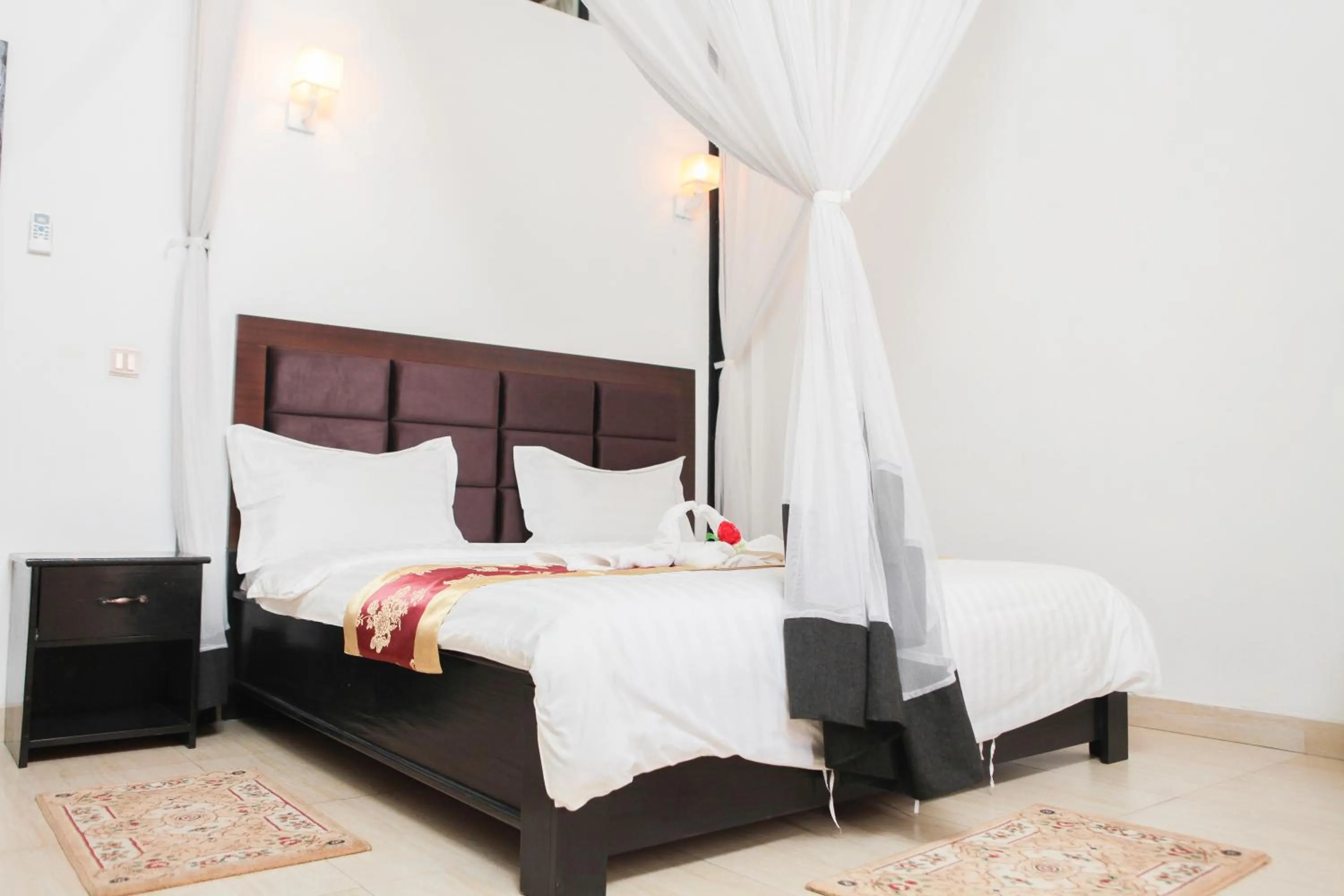 Bed in Hotel Kangaroo Bujumbura