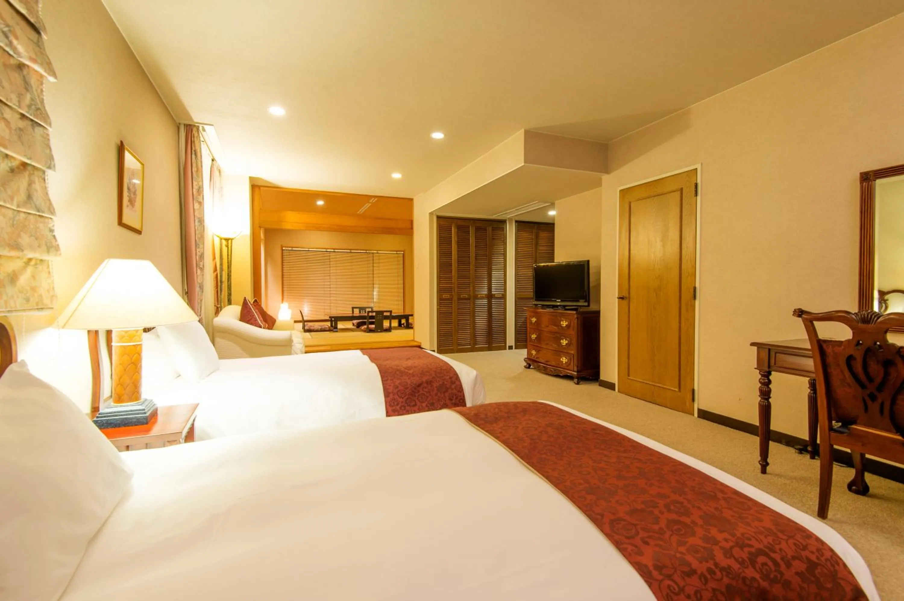 Bed in Hakuba Mominoki Hotel