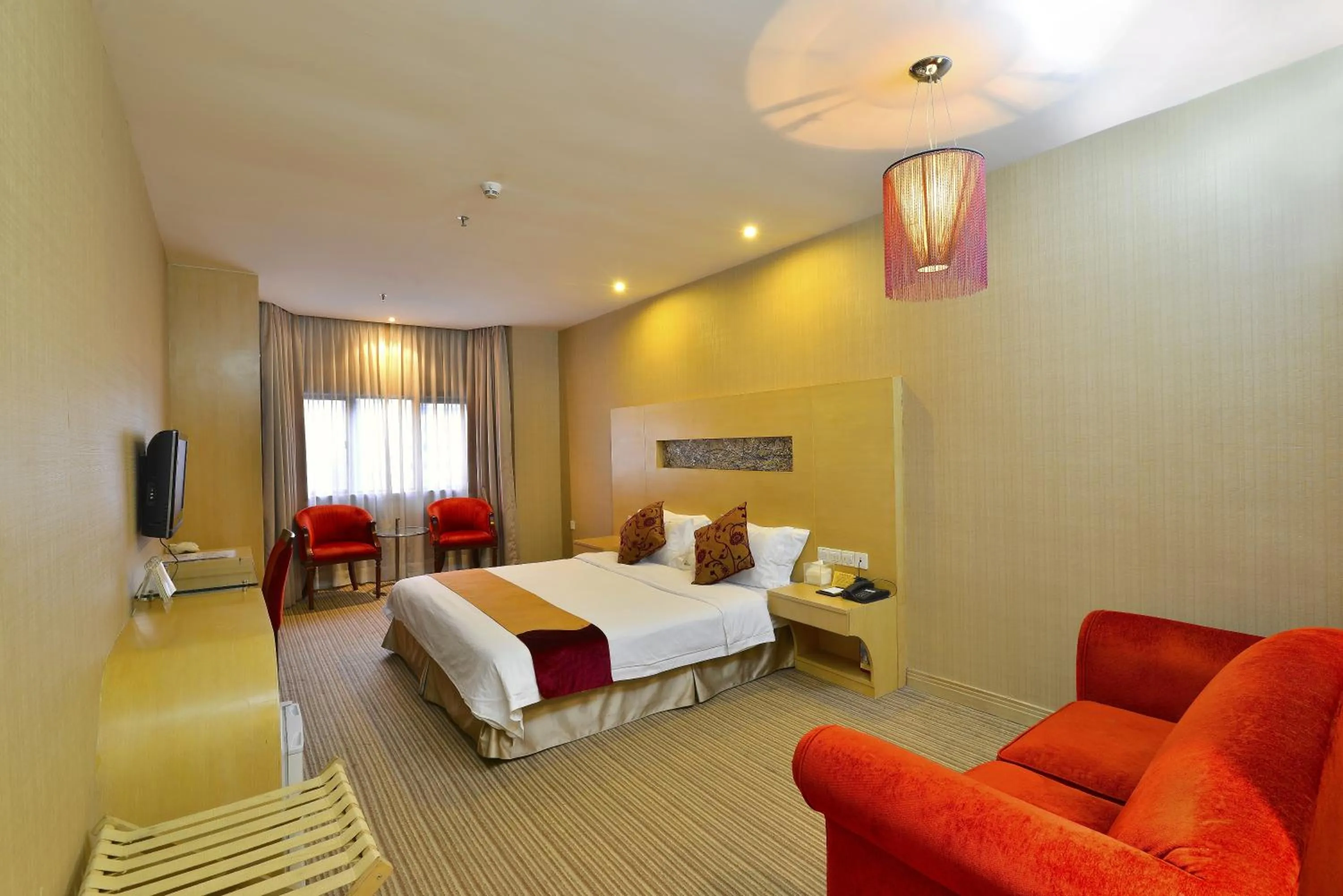 Bedroom in Shenzhen Sunon Hotel,Dongmen (Formerly Sunon Holiday Villa Hotel)