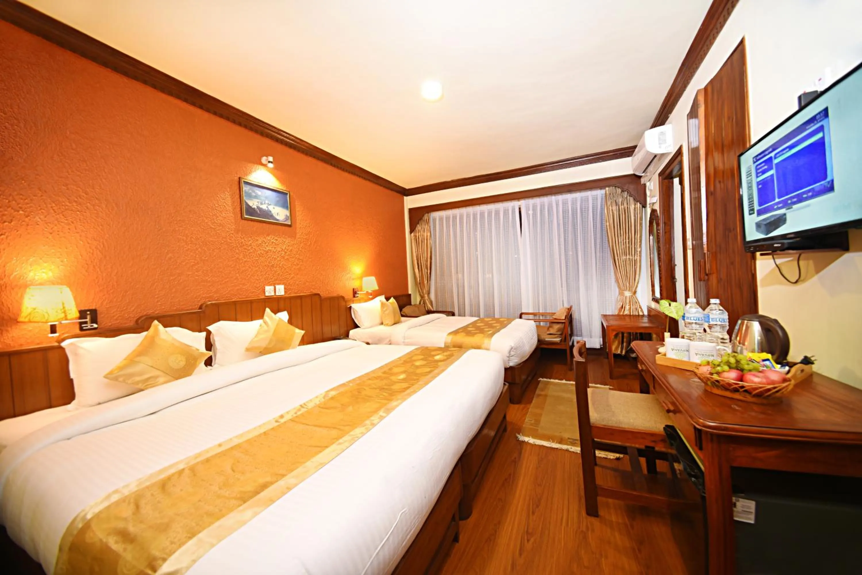 Bed in Nirvana Boutique Hotel