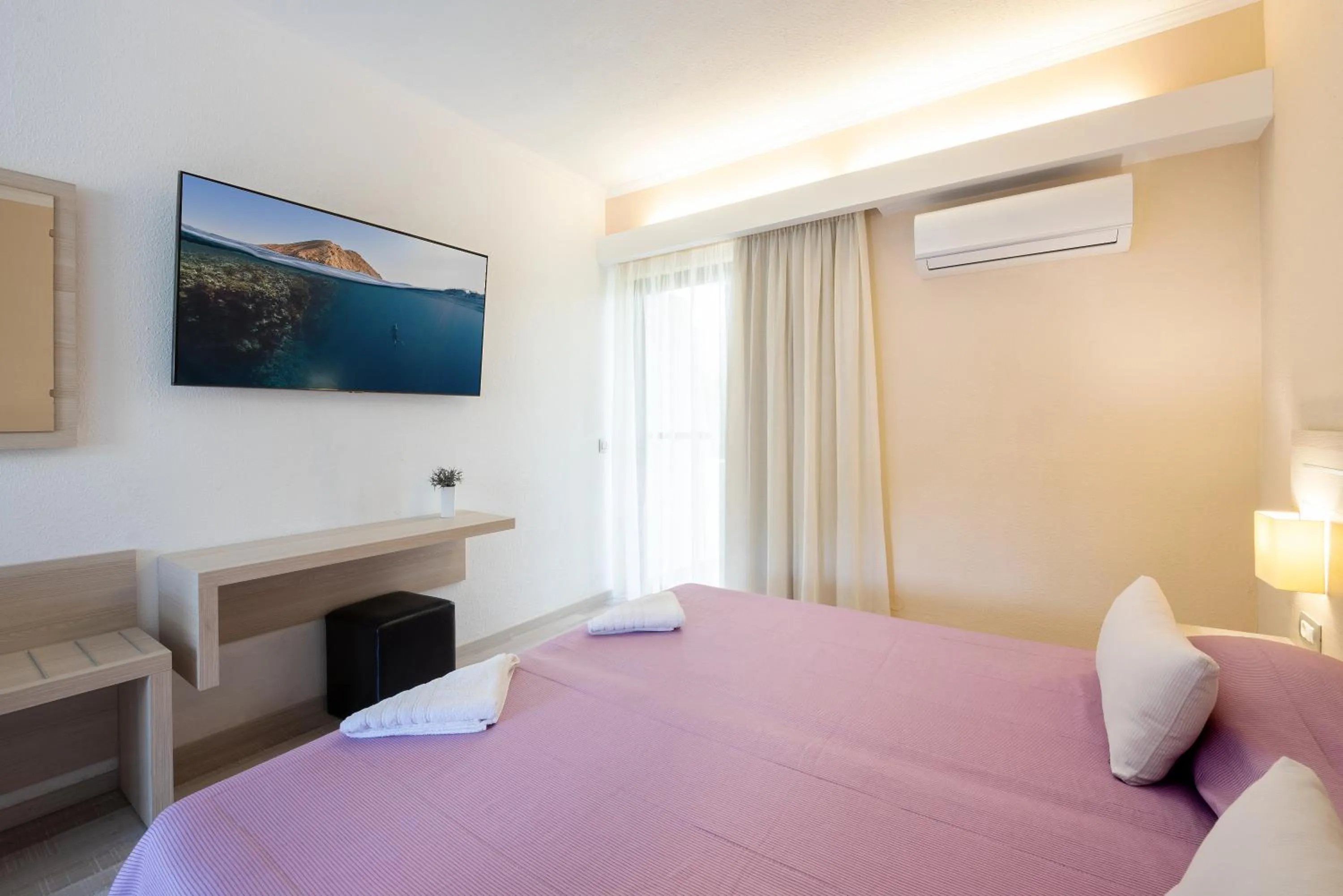 Bed in Terinikos Sunny Garden Hotel & Junior Suites New Renovation 2025