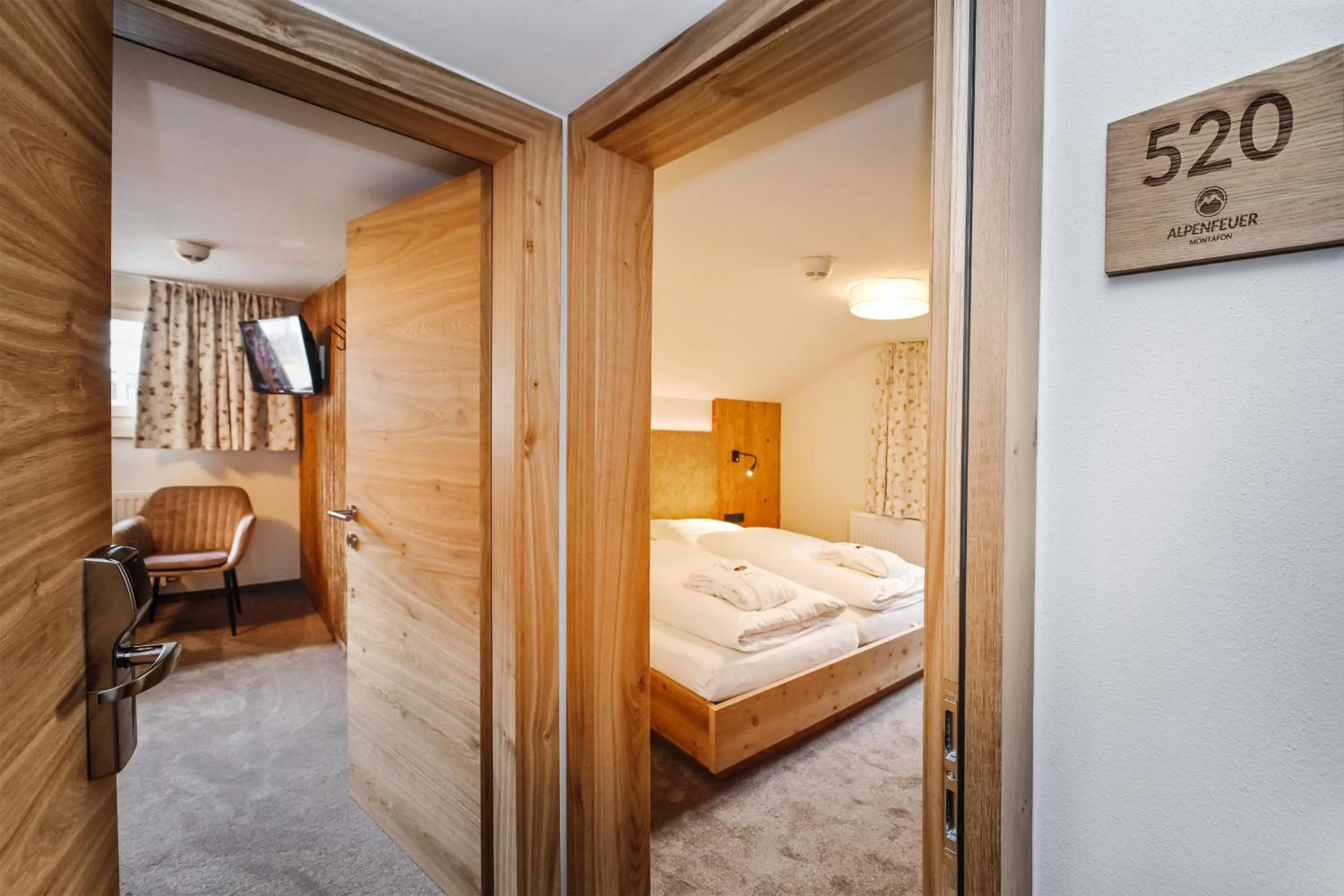 Photo of the whole room, Bed in Hotel Alpenfeuer Montafon