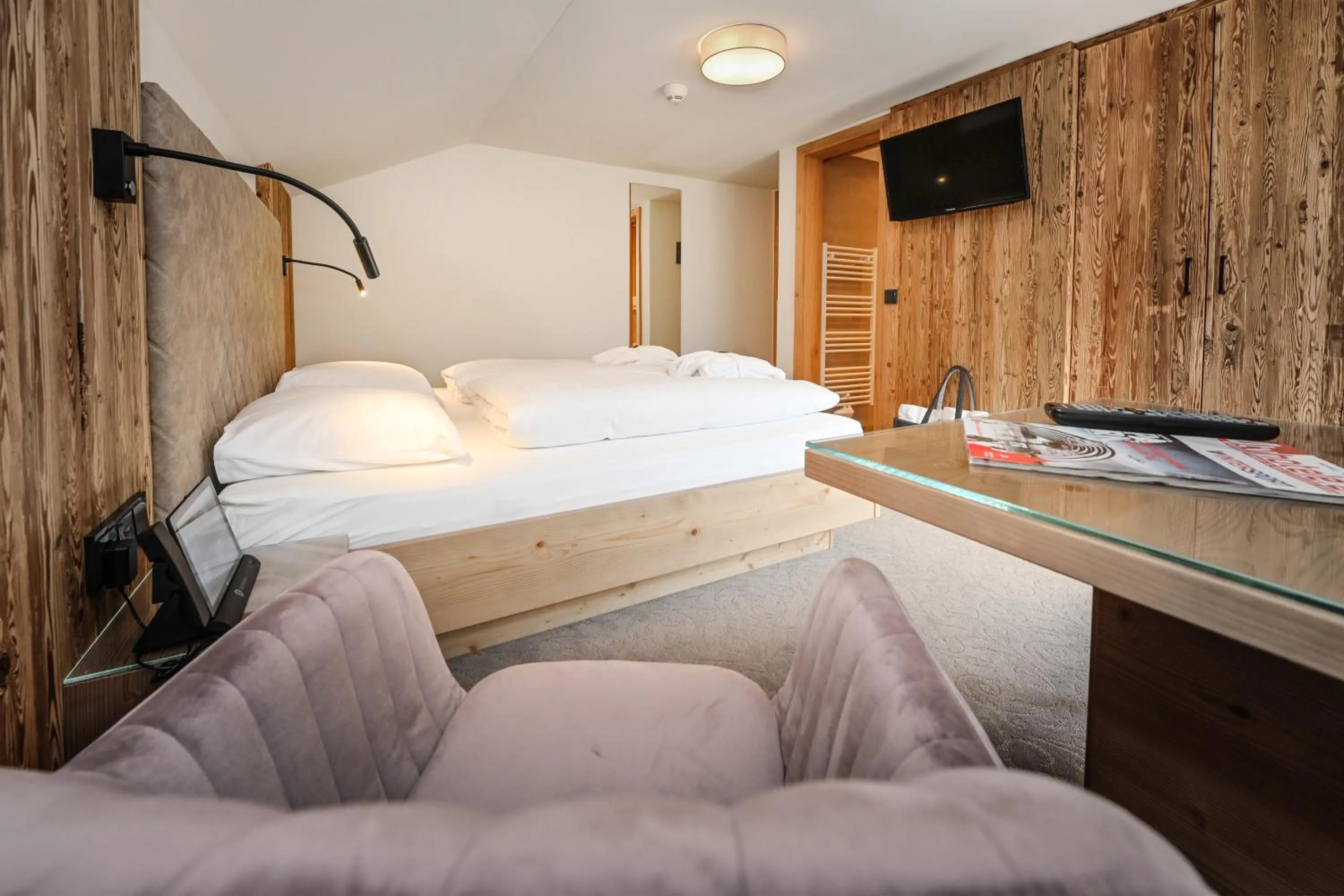 Photo of the whole room, Bed in Hotel Alpenfeuer Montafon