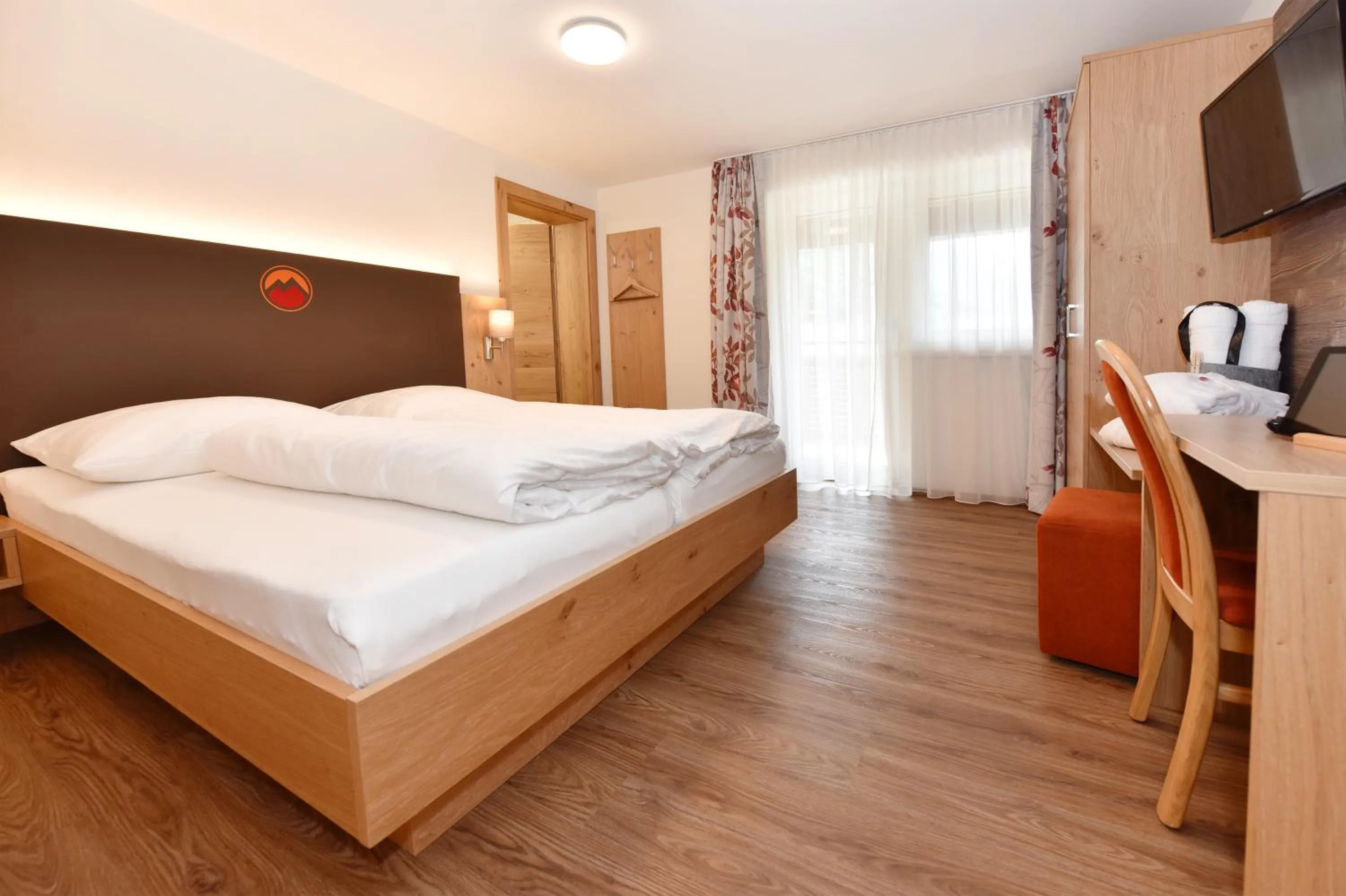 Photo of the whole room, Bed in Hotel Alpenfeuer Montafon