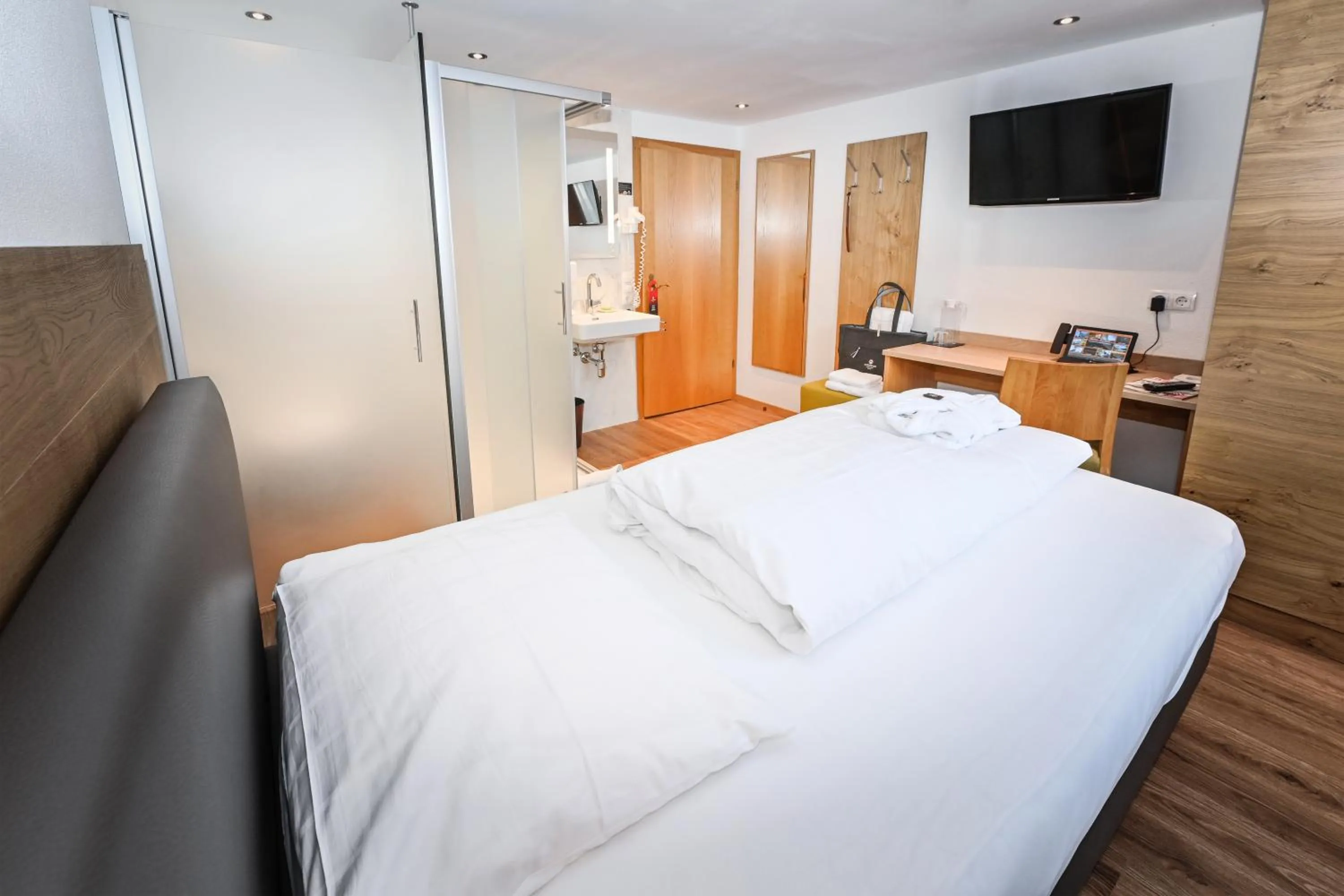 Photo of the whole room, Bed in Hotel Alpenfeuer Montafon