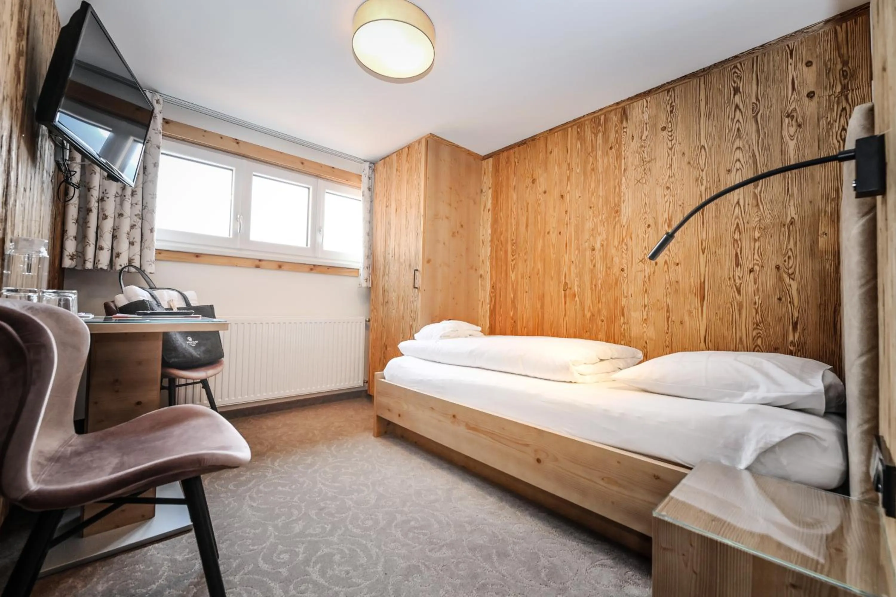 Photo of the whole room, Bed in Hotel Alpenfeuer Montafon