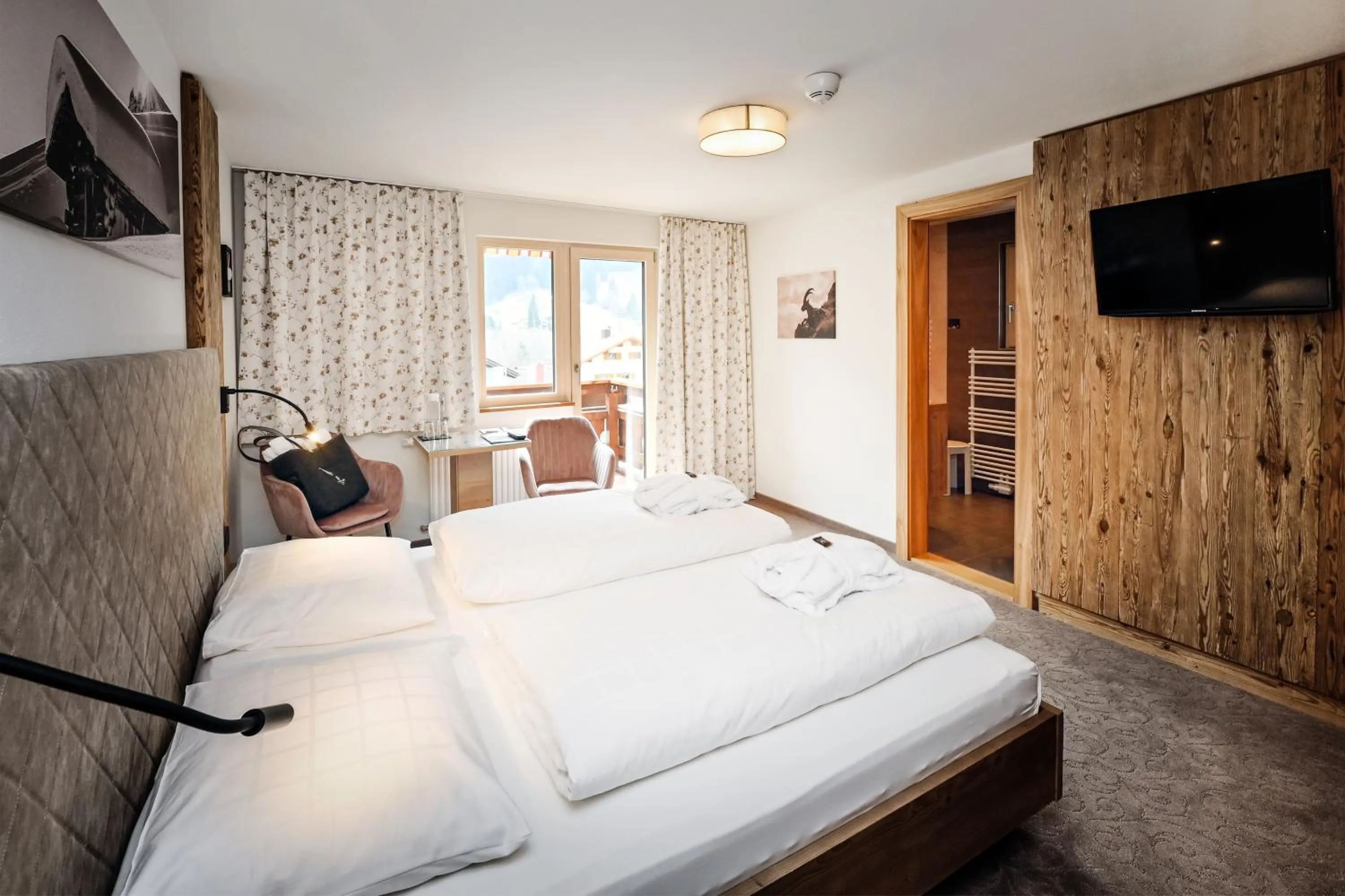 Photo of the whole room, Bed in Hotel Alpenfeuer Montafon