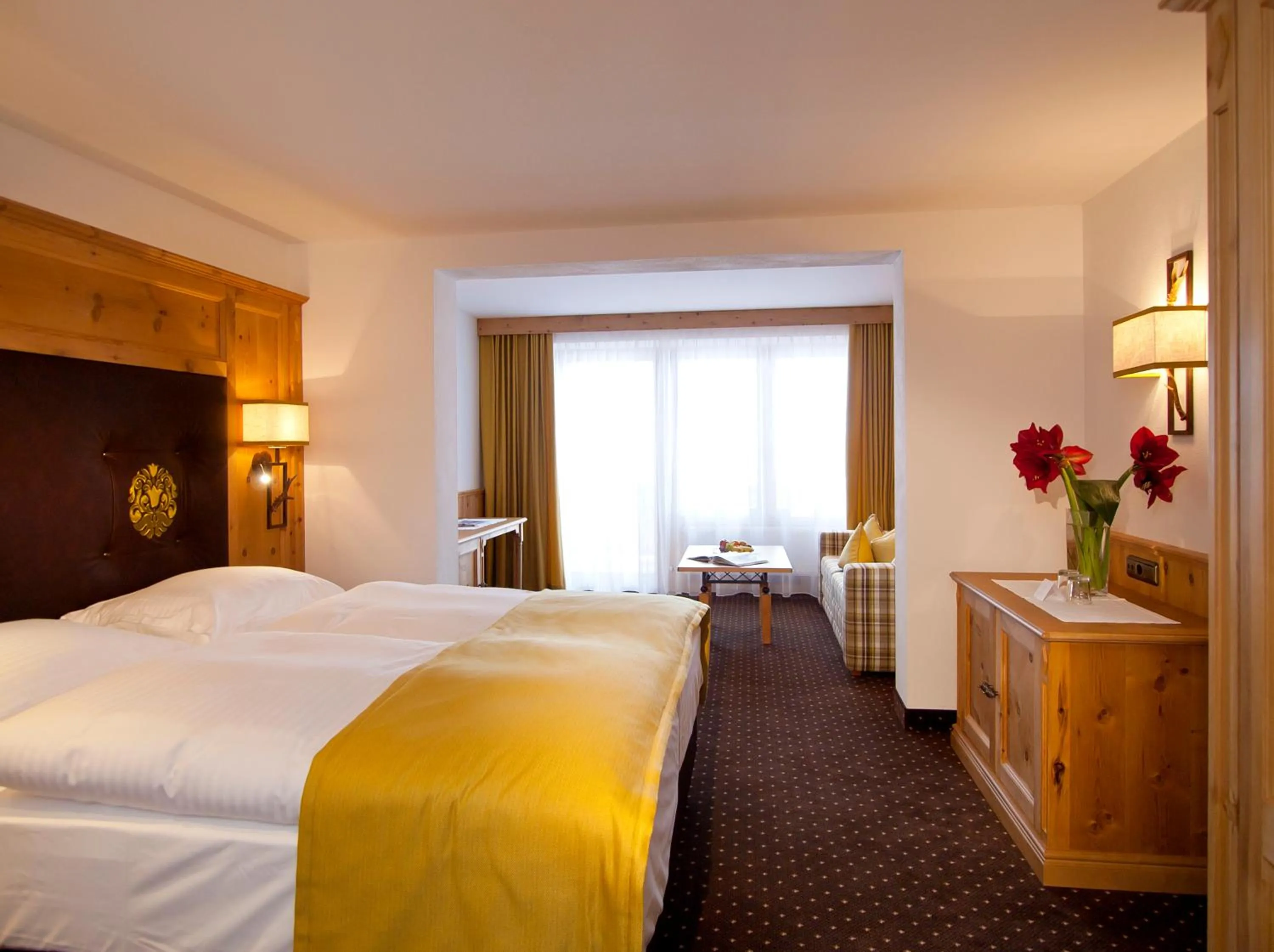 Photo of the whole room, Bed in Sporthotel Ellmau in Tirol