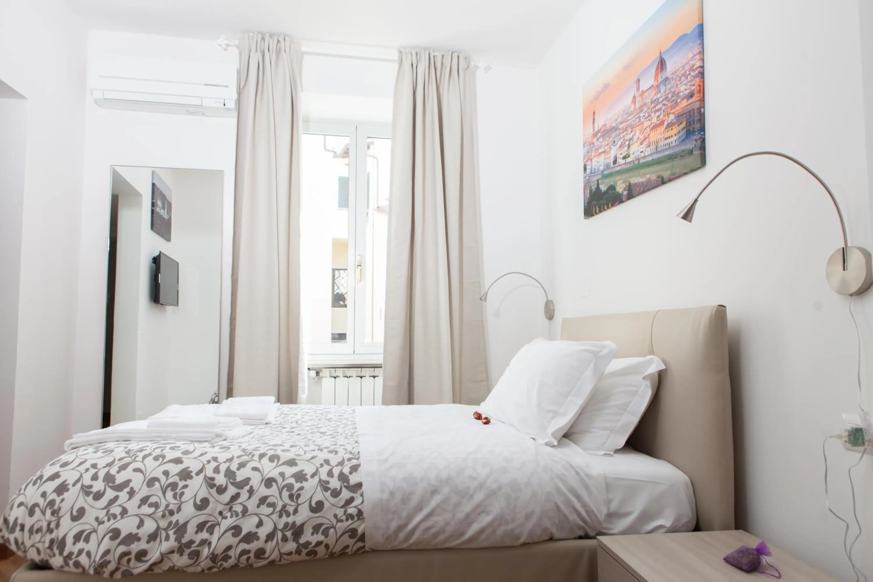 Bed in Le Tre Lune Suites