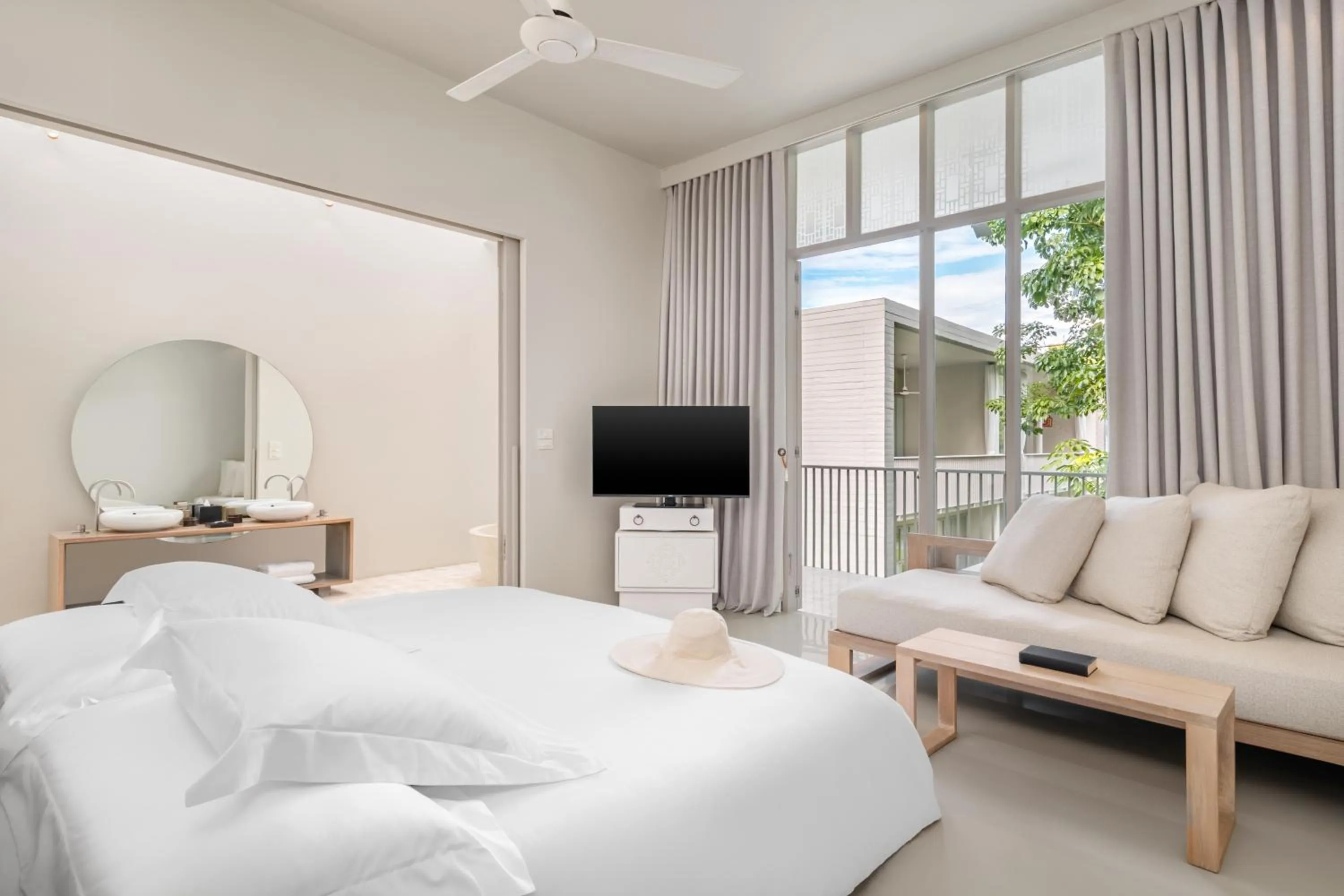 Bed in SALA Phuket Mai Khao Beach Resort