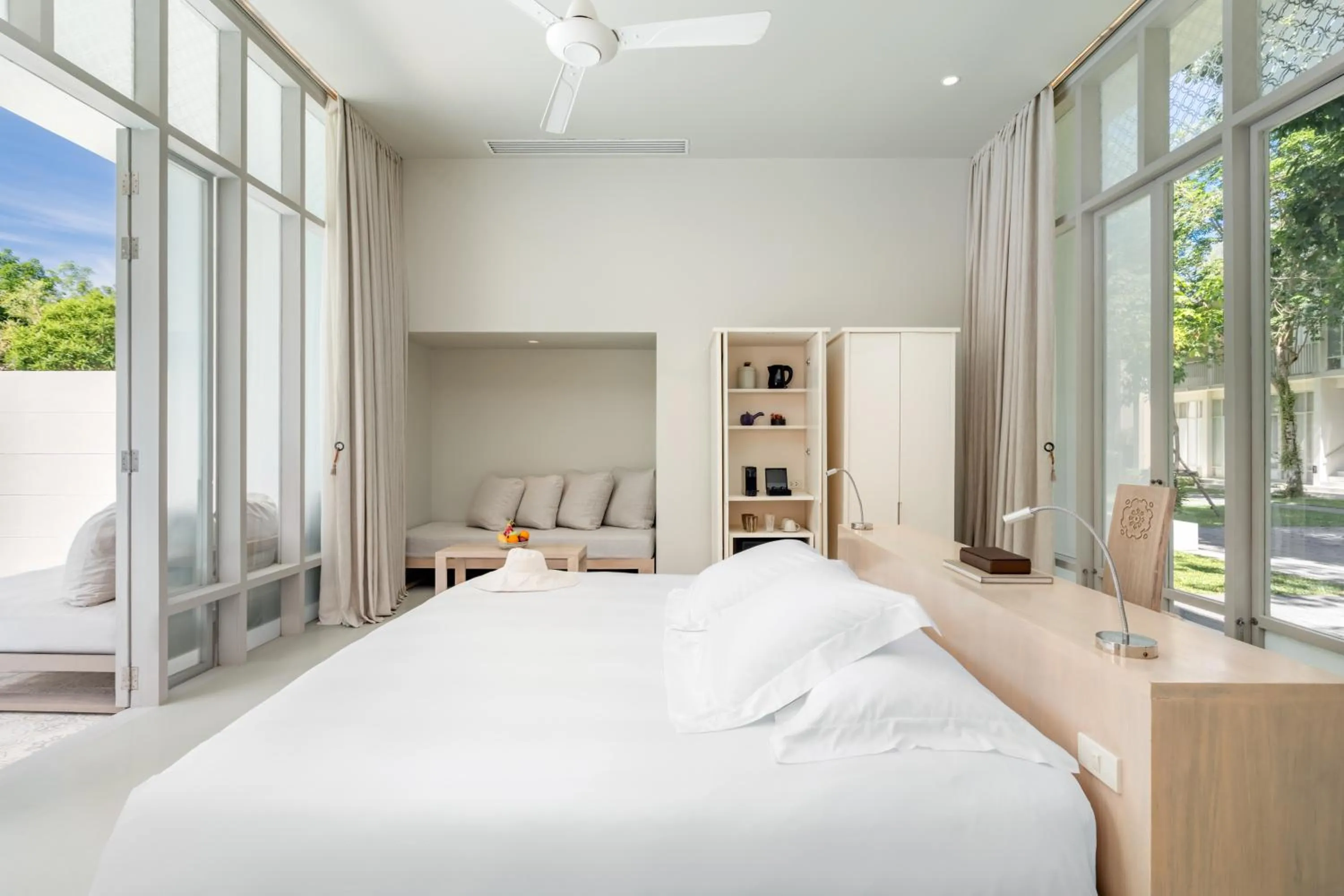 Bed in SALA Phuket Mai Khao Beach Resort