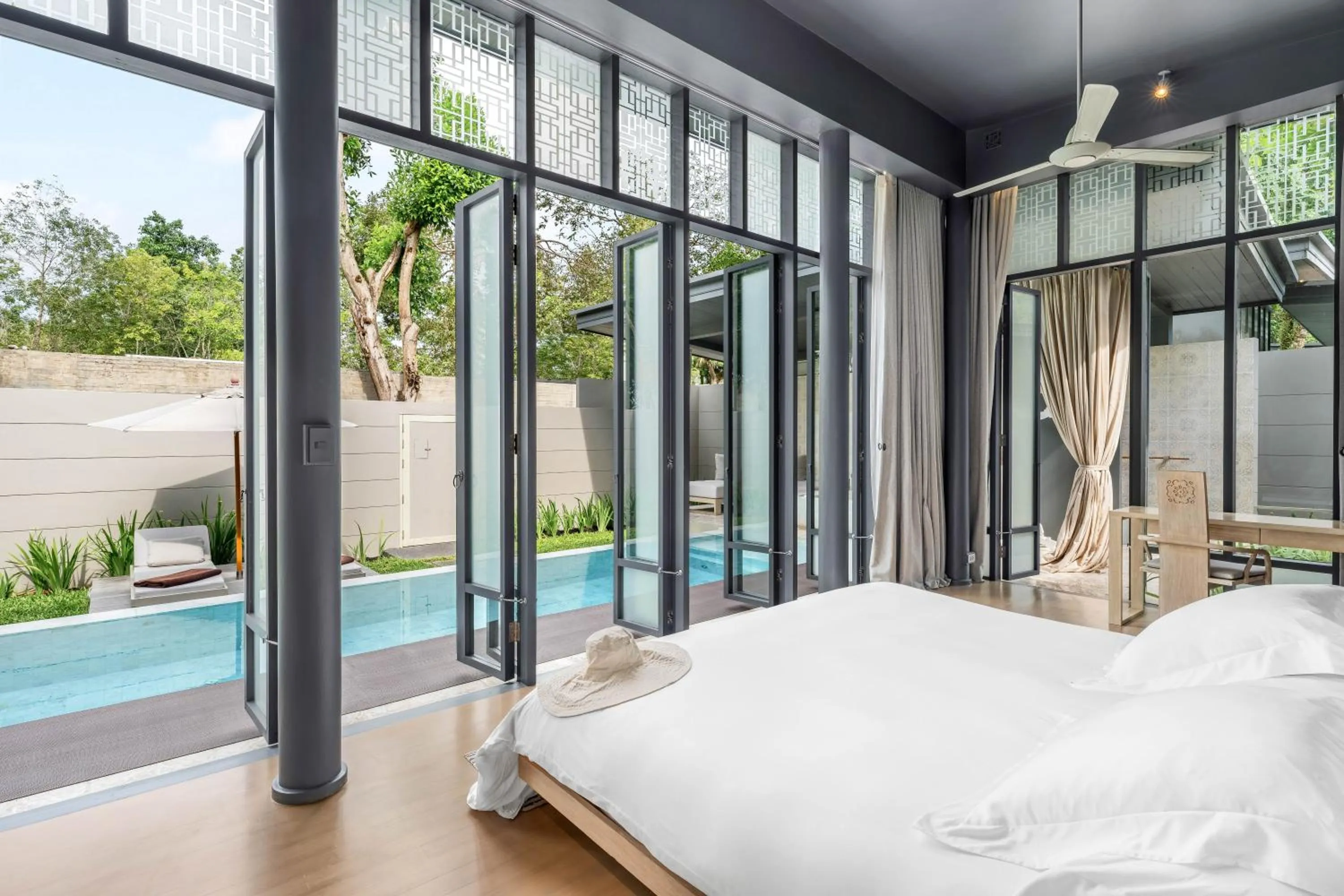 Bed in SALA Phuket Mai Khao Beach Resort