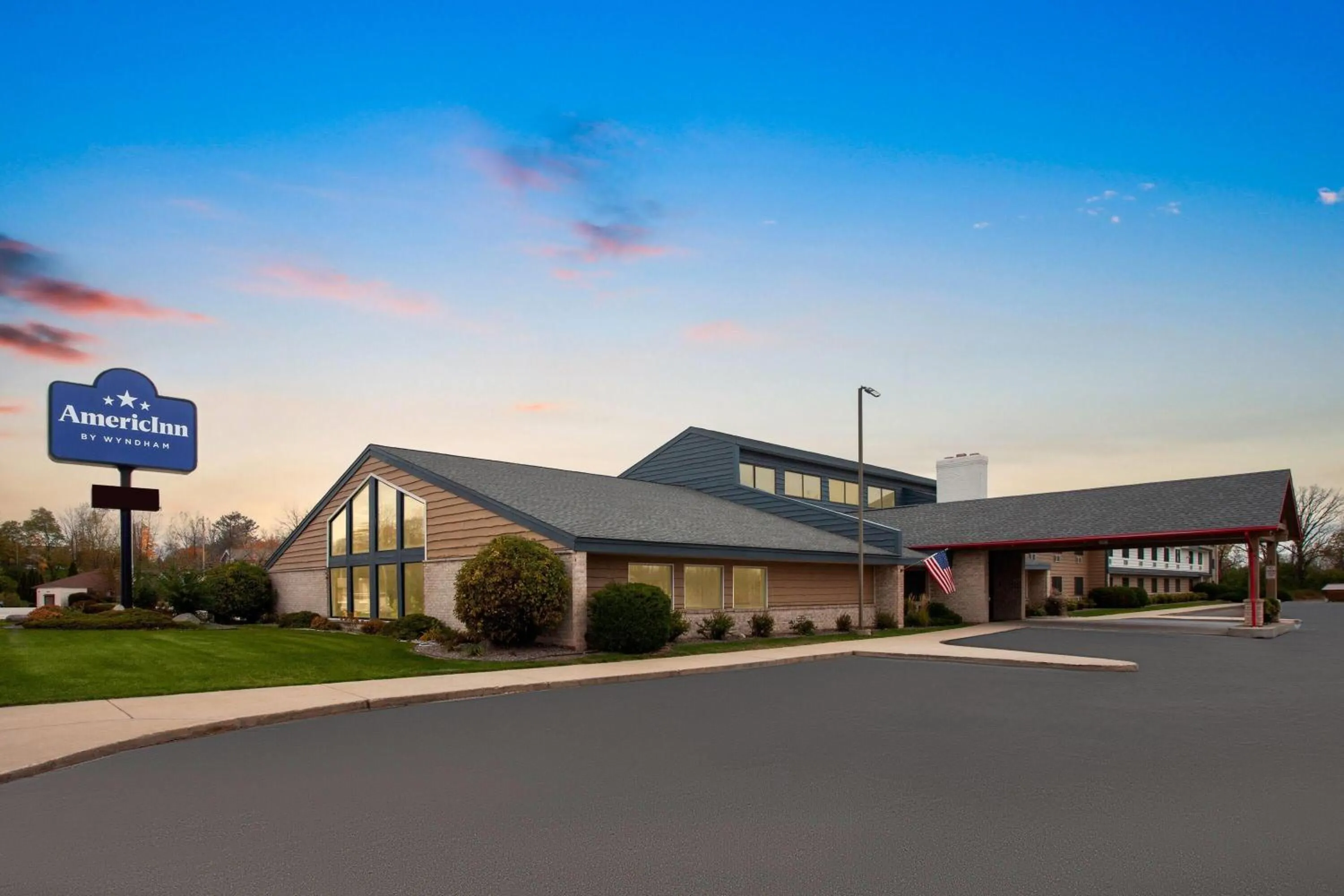 Property building in AmericInn by Wyndham Green Bay West