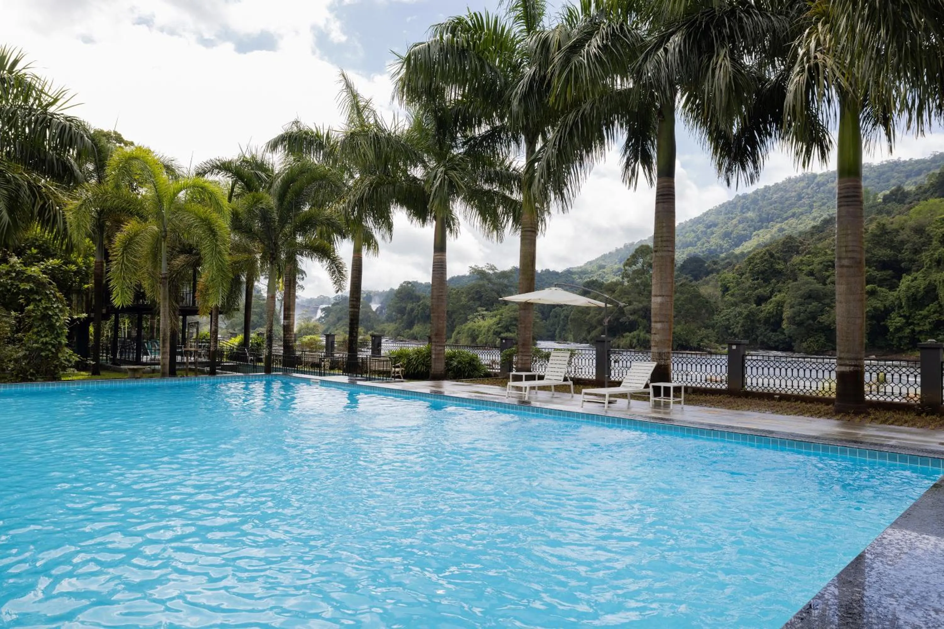 Swimming pool in Casa Rio Resorts Athirappilly