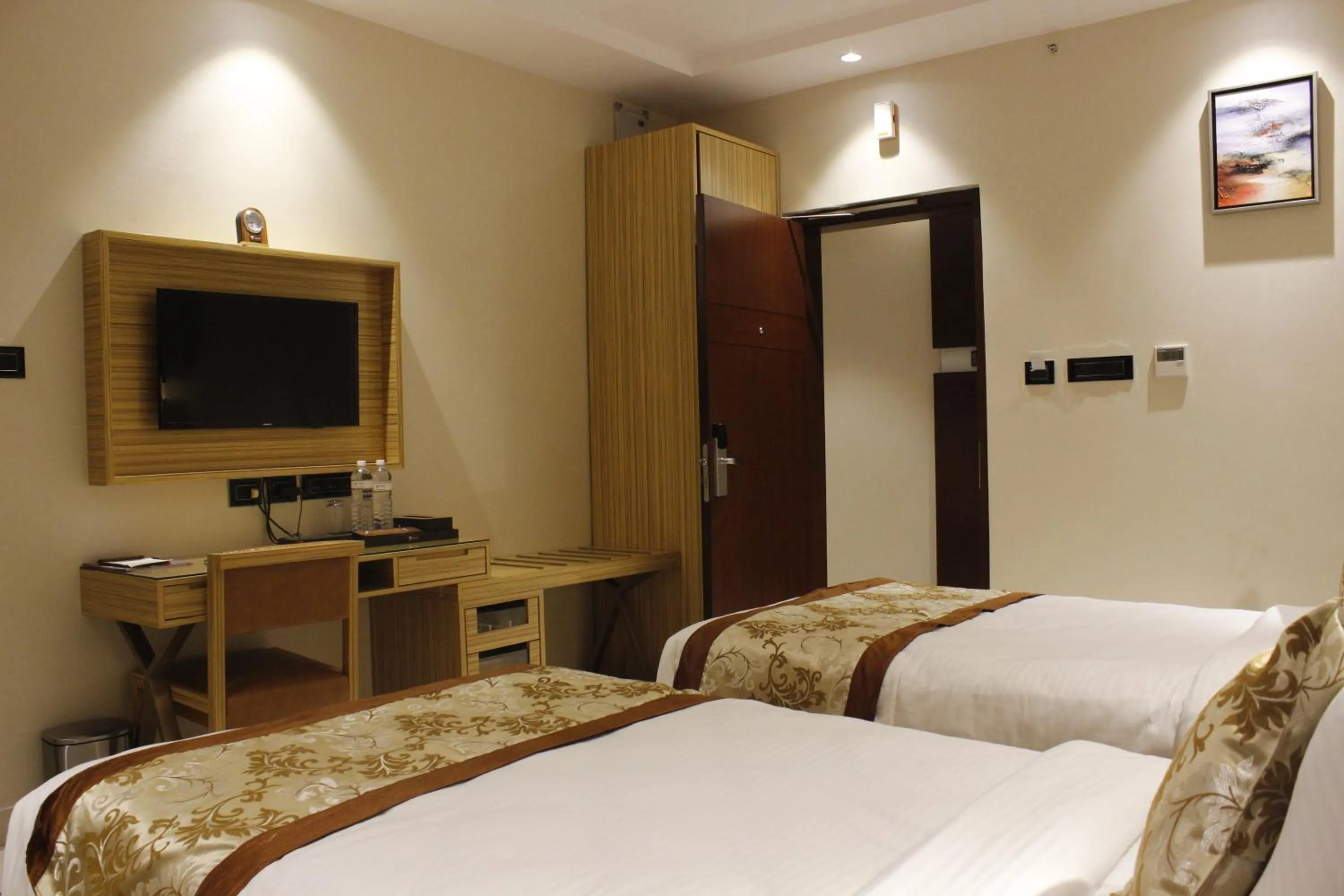 Bed in Mango Hotels Vijayawada