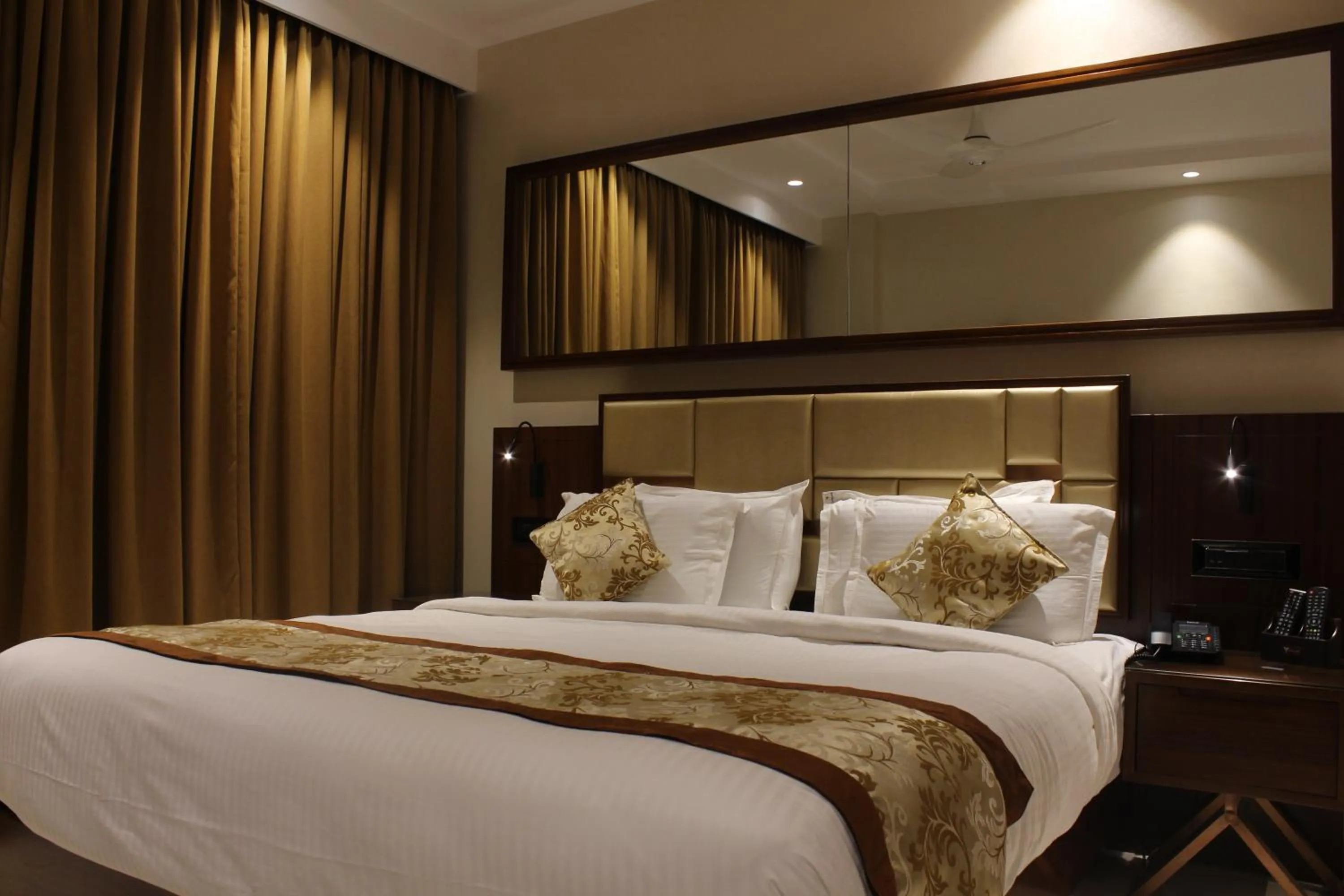 Bed in Mango Hotels Vijayawada