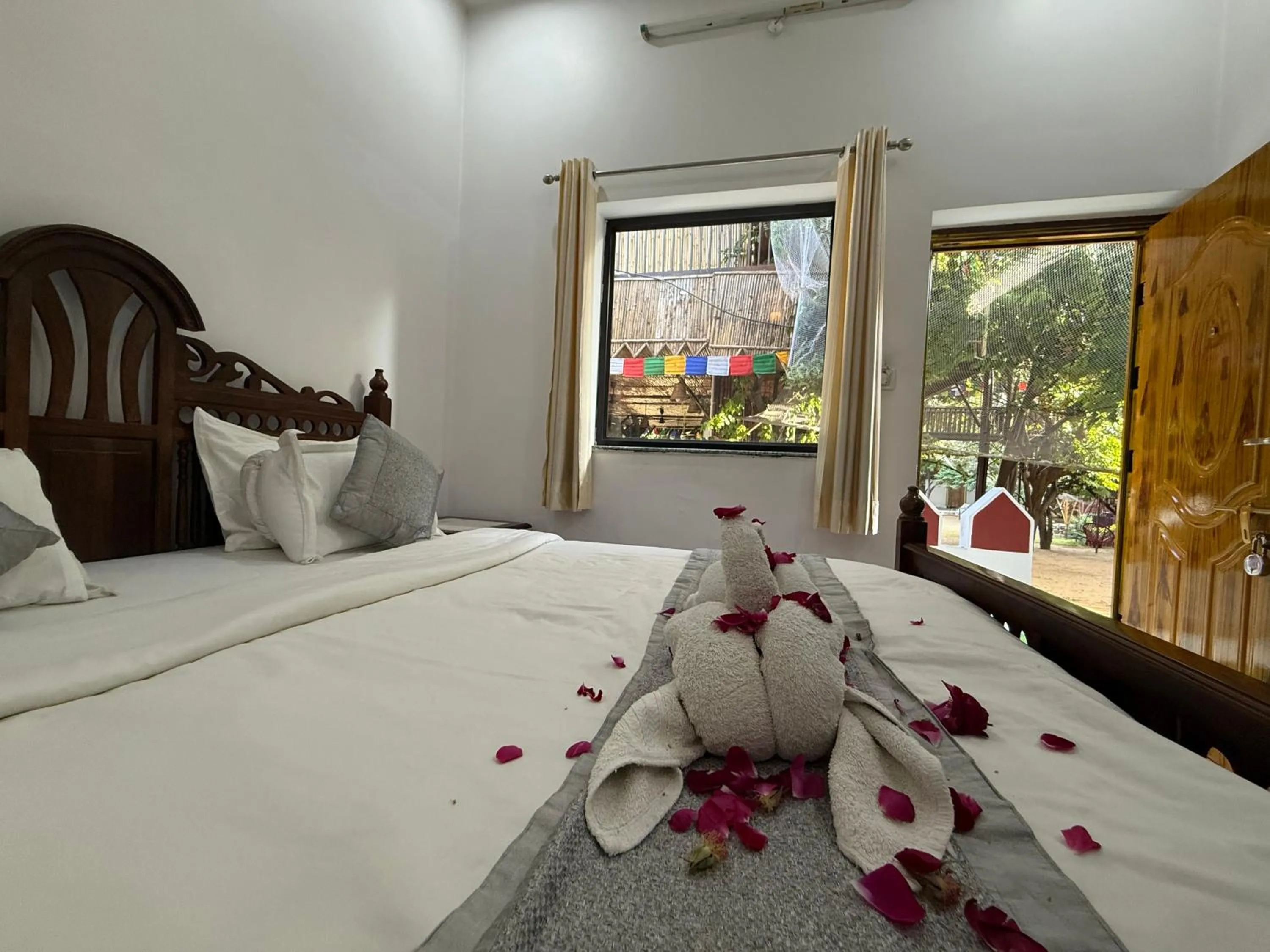 Bed in Hotel Green Heaven Resort