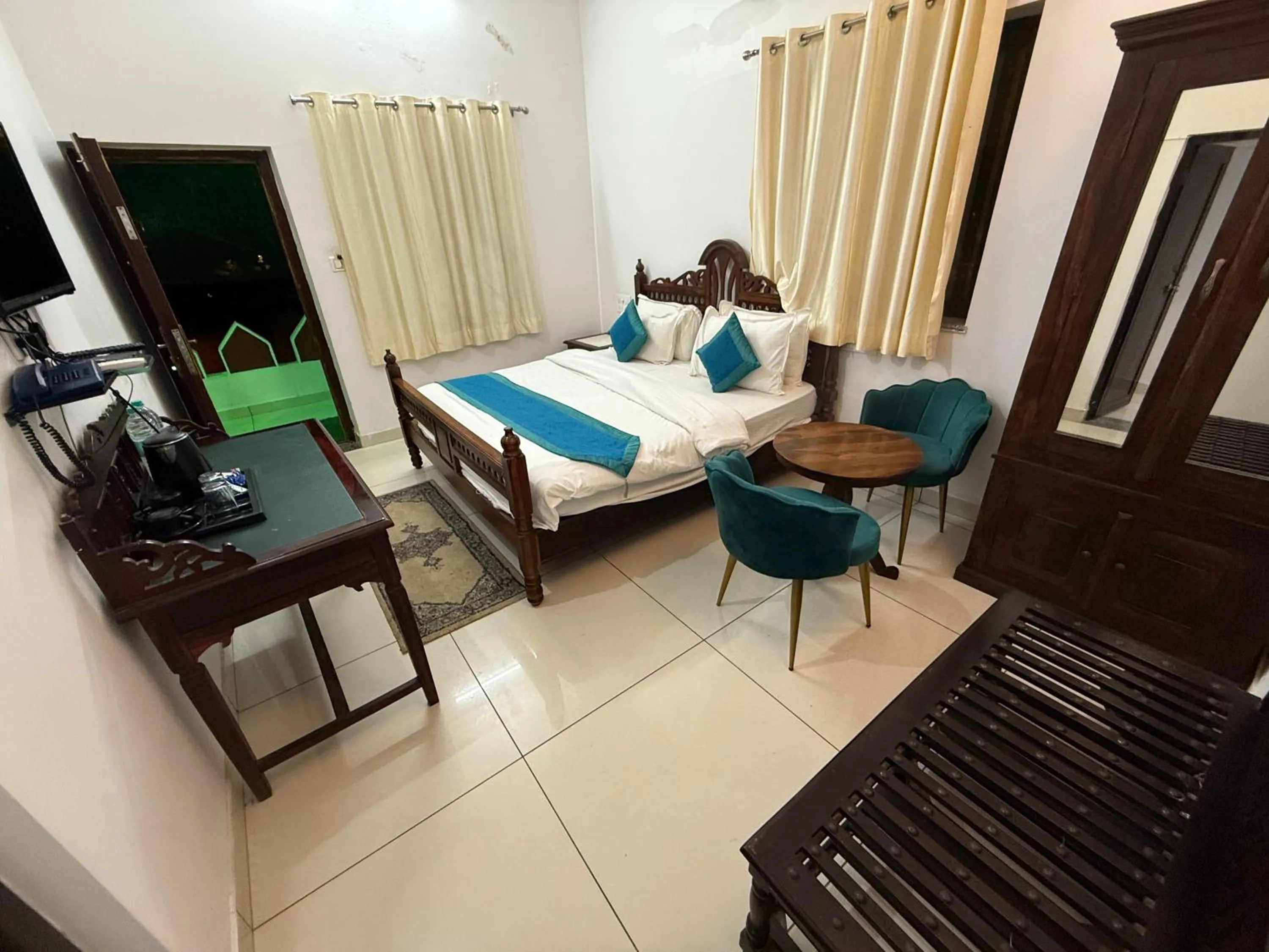 Bed in Hotel Green Heaven Resort